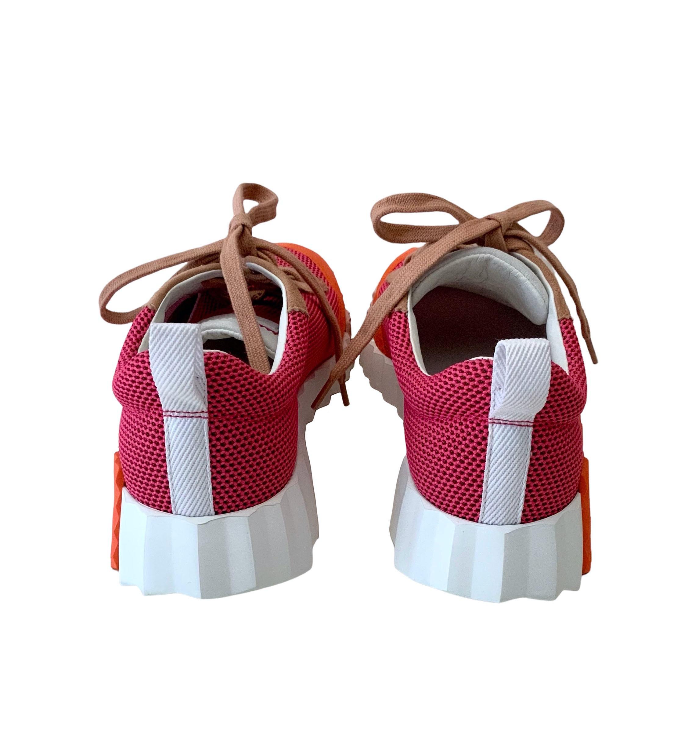 Great look for these pre-owned but new Bouncing Sneakers !

Collection: Bouncing 2022
Material: Technical canvas and suede goatskin
Color: Orange and Pink
Lining and insole: white goatskin
Sole: white rubber with orange rubber H insert 
Size: