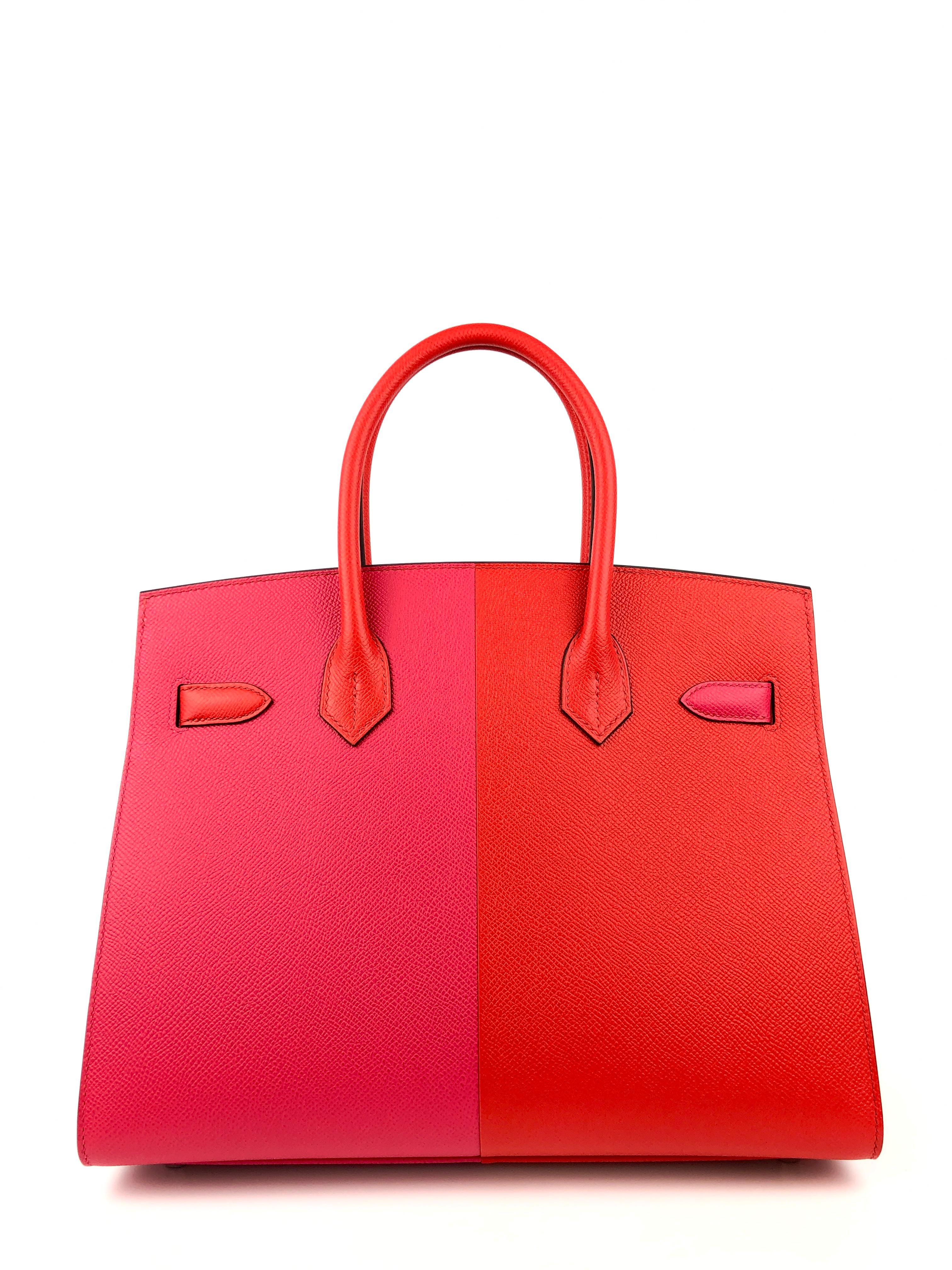This authentic Hermès Pink and Red Epsom Sellier 30 cm Birkin is in pristine condition with the protective plastic intact on the hardware.  Extremely rare, the more structured Sellier silhouette is created with stitching on the outside of the bag. 