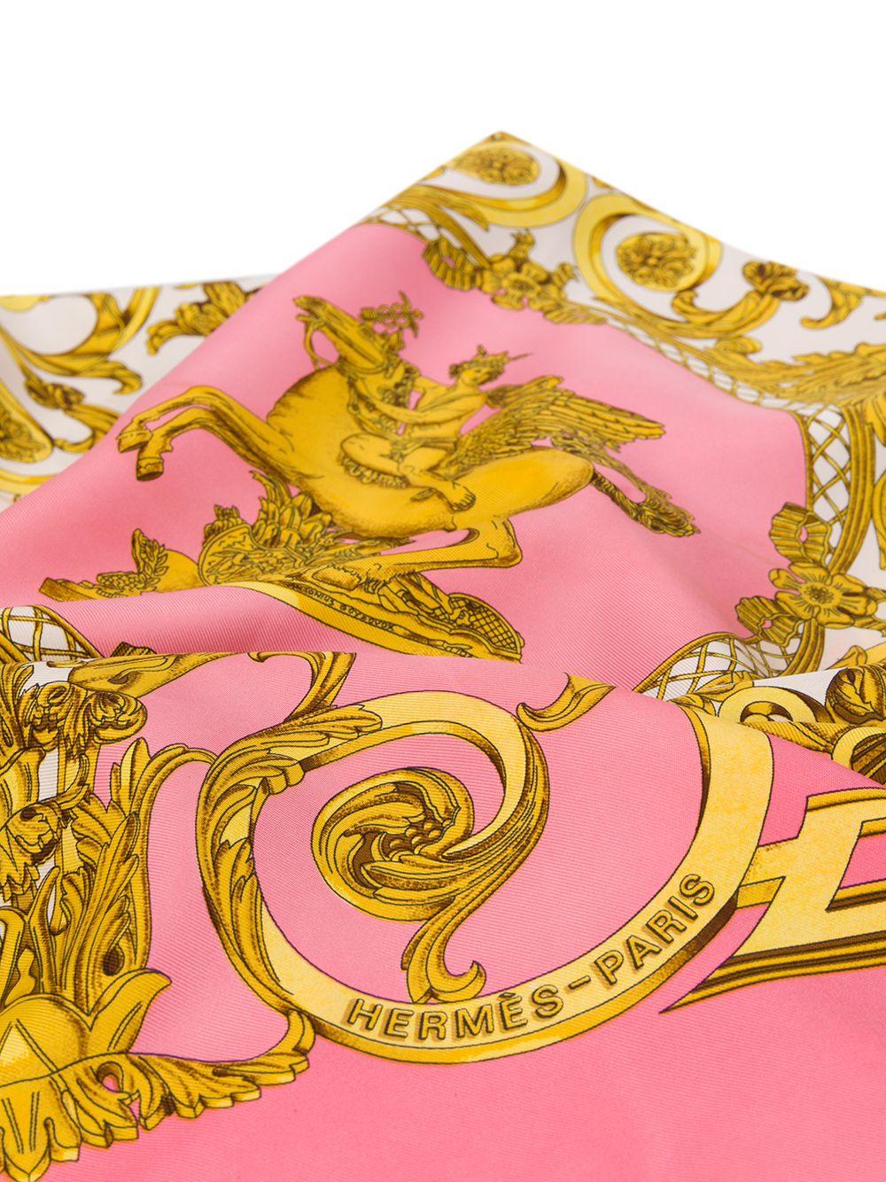 Crafted in France from the finest pink silk, this pre-owned scarf by Hermès features a lightweight construction, a square shape and an elegant, all-over 'baroque print' motif print in a contrasting shades of gold, white and grey. The piece is