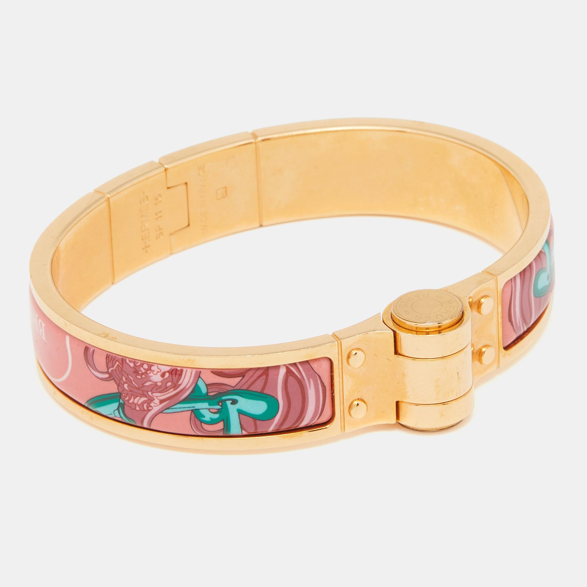 A classic Hermes bracelet is so simple, effortless, and yet so chic and luxurious that it is worn over and over again once purchased. It never goes out of style. Constructed using gold-plated metal, this piece is beautified with enamel.

