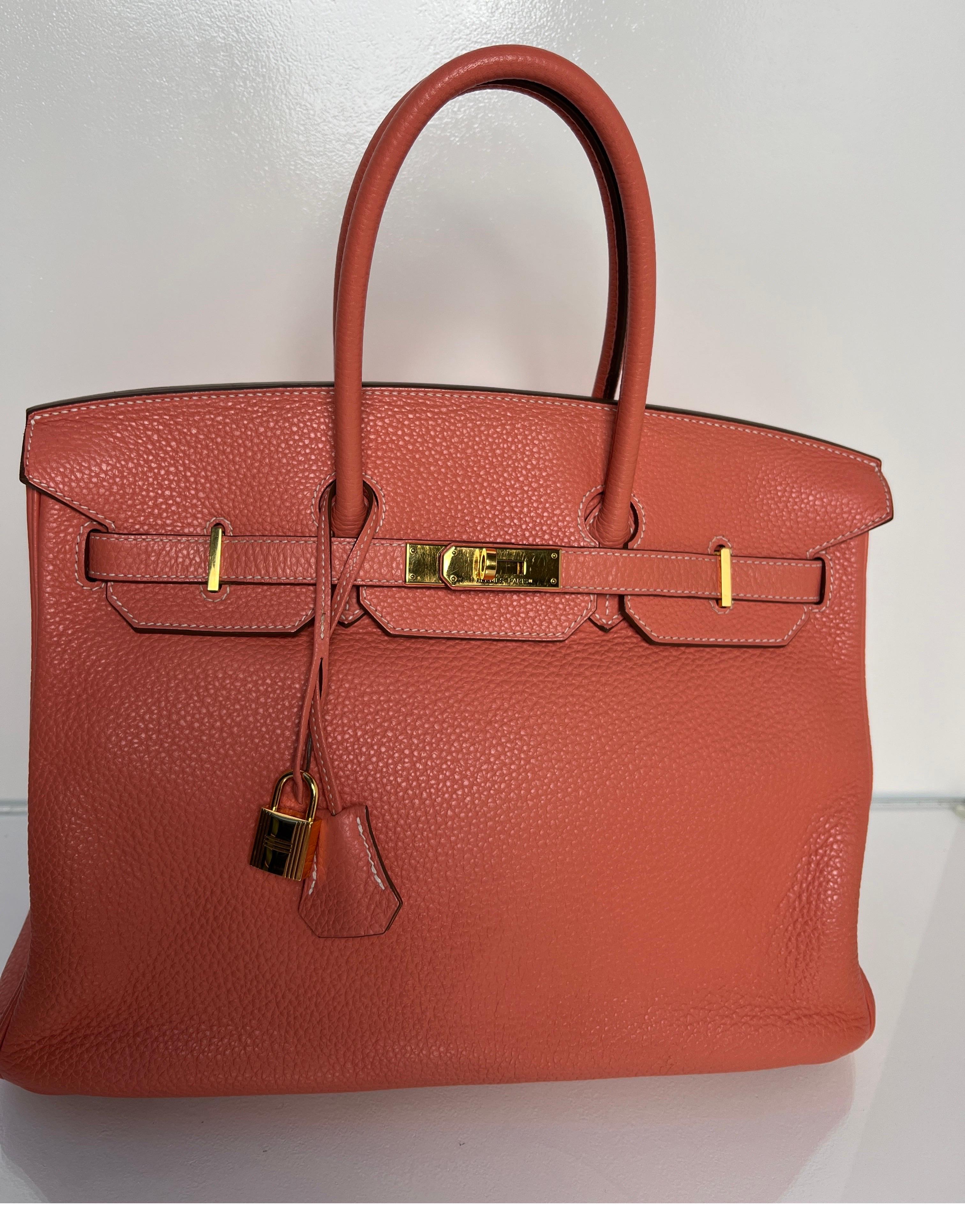 Hermes Pink Crevette Birkin 35 Bag. Rare color combination with gold hardware. Light flamingo pink color. Clemence leather. Light wear throughout. Good condition. Slight slouch due to the leather. Interior clean. Includes clochette, lock, keys, and