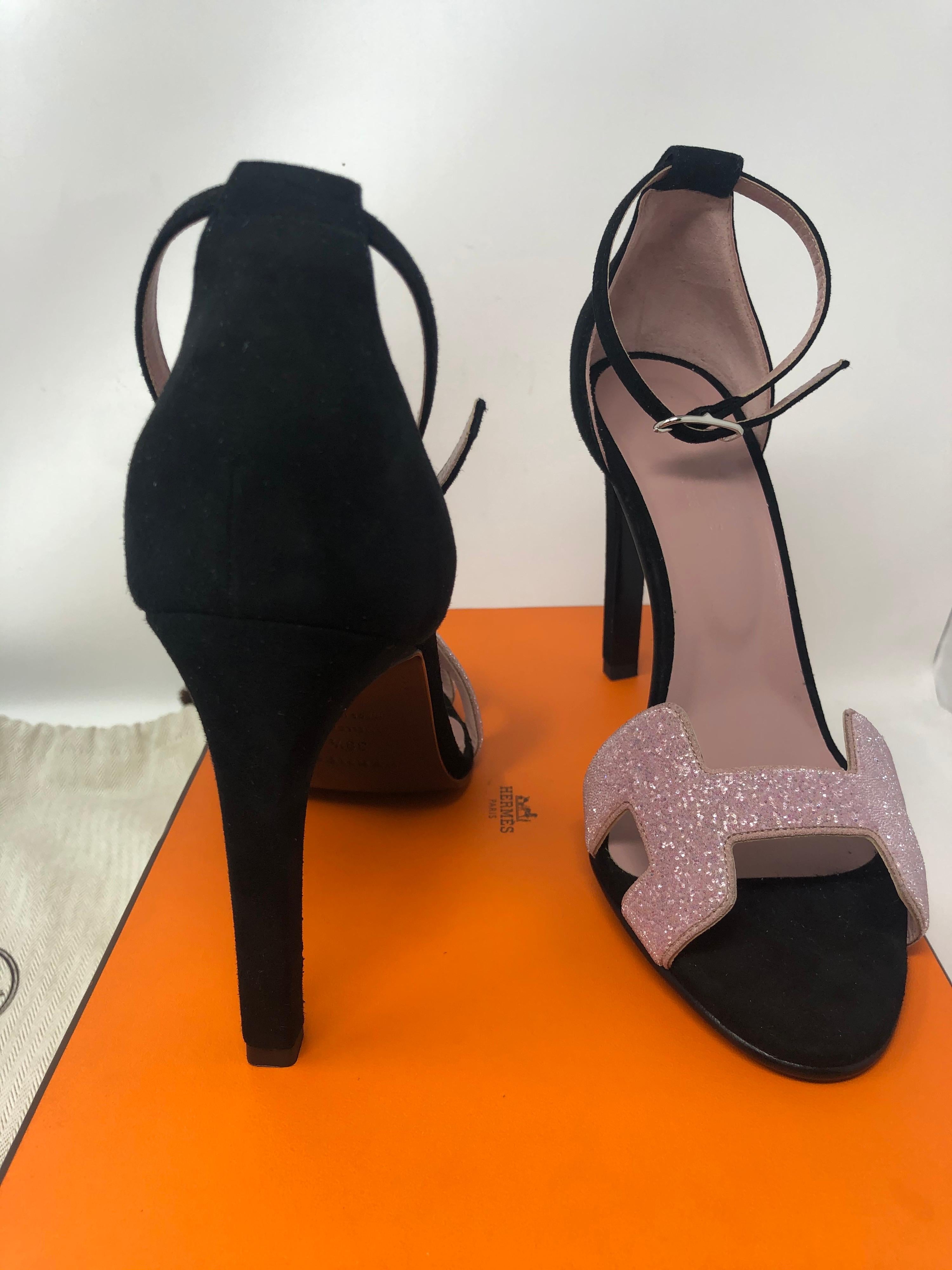 Hermes pink and black heels. Brand new never worn. European size 38.5 US size 8-8.5. Gorgeous shoes. Will include original Hermes box. Guaranteed authentic. 