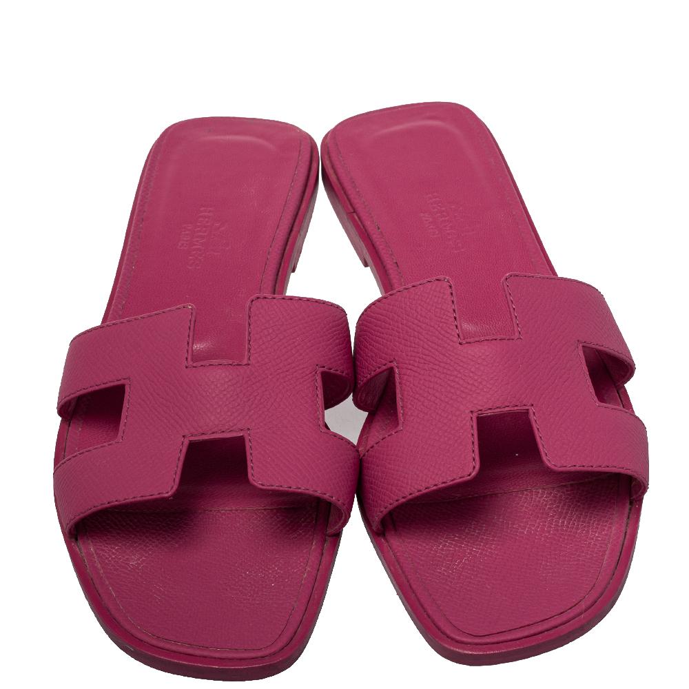 Put your best foot forward this season in these pretty Hermes sandals. These pink Oran sandals have been crafted from leather in Italy and they feature the iconic H on the vamps as well as insoles meant to provide comfort at every step. These