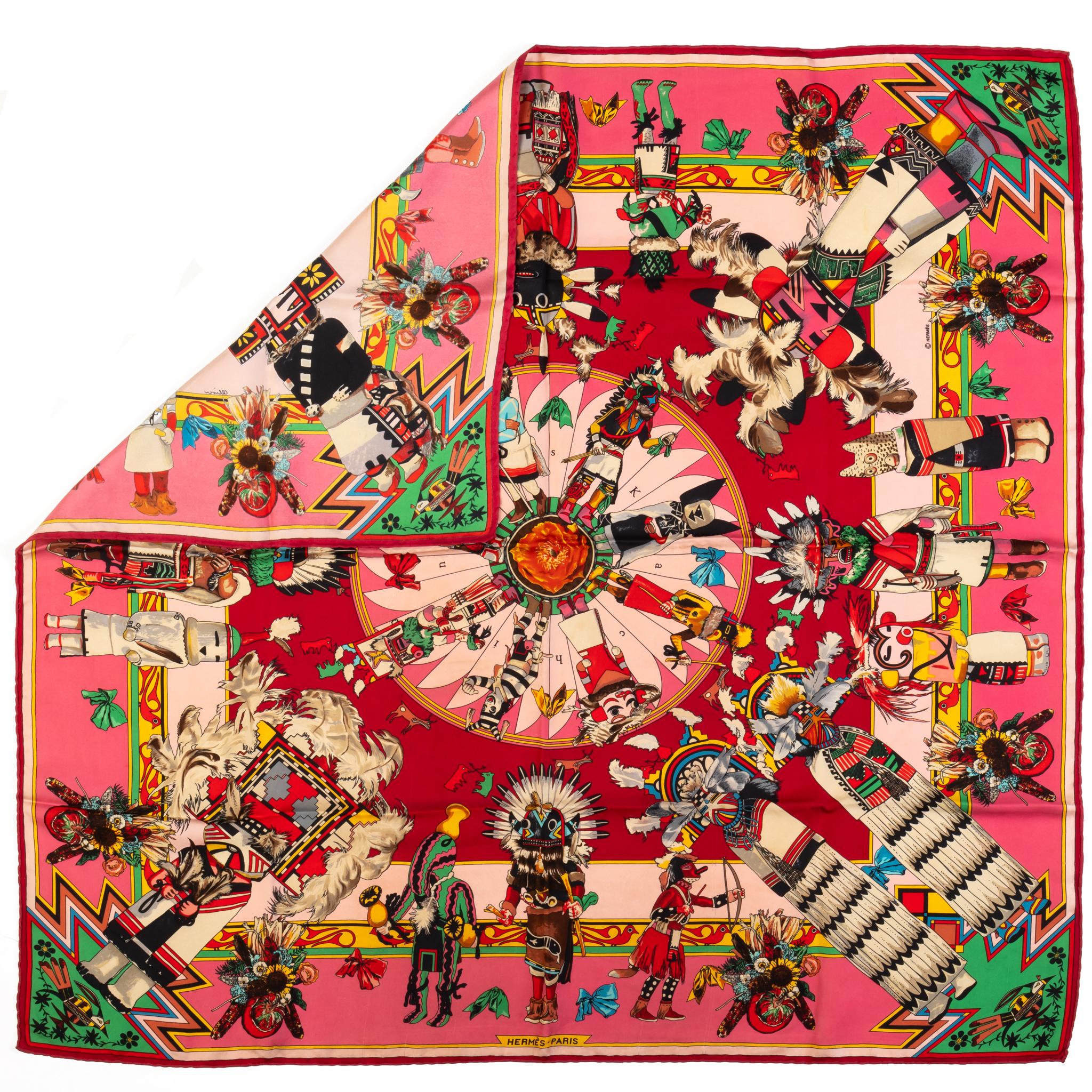 Hermès collectible pink Kachinas silk scarf by Kermit Oliver. A little spot, thread pulled. No box, no label.
