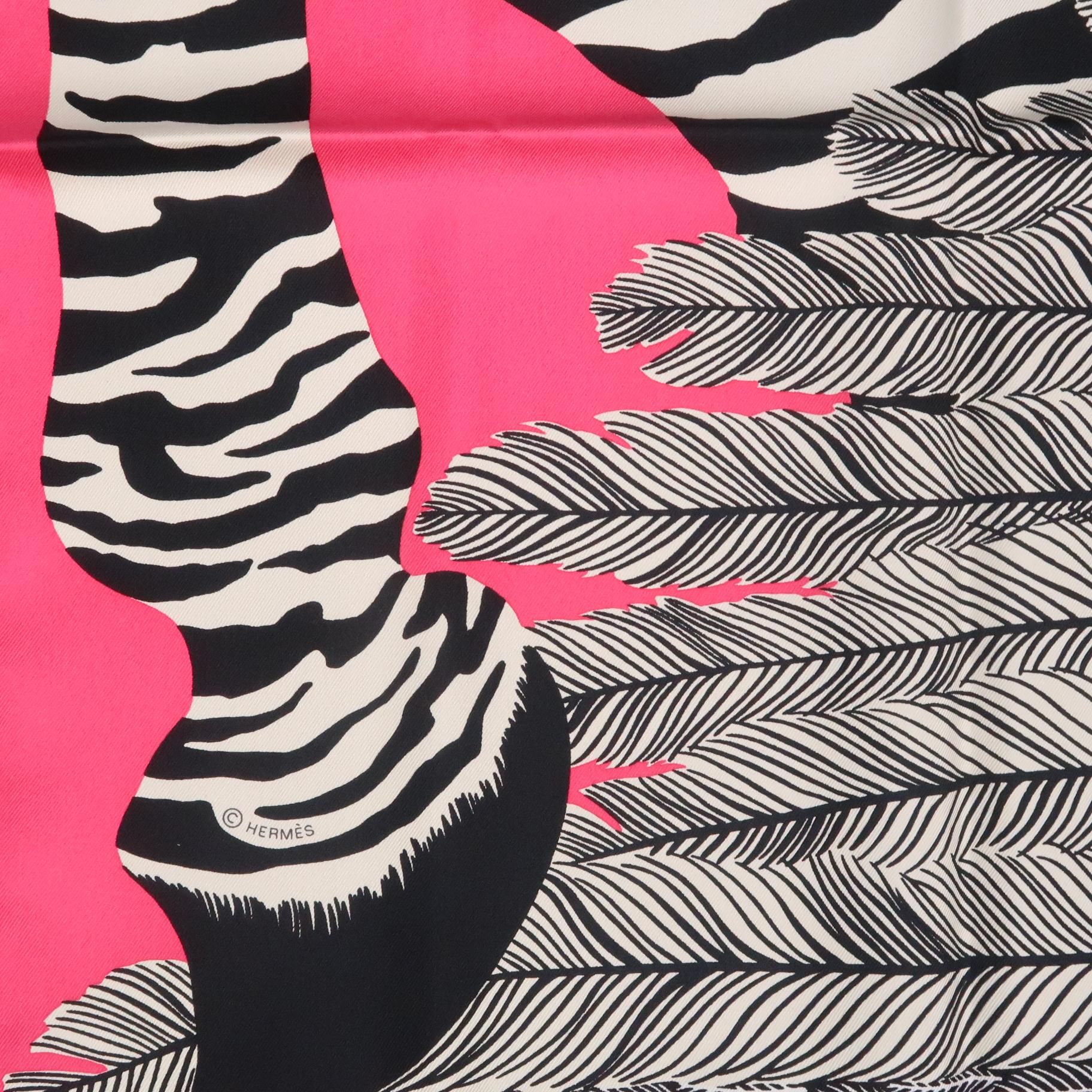 HERMES scarf comes in hot pink silk twill with black and white Zebra Pegasus graphic print. Made in France. Sold out.
 
New with Tags in Original Box.
 
90 x 90 cm.