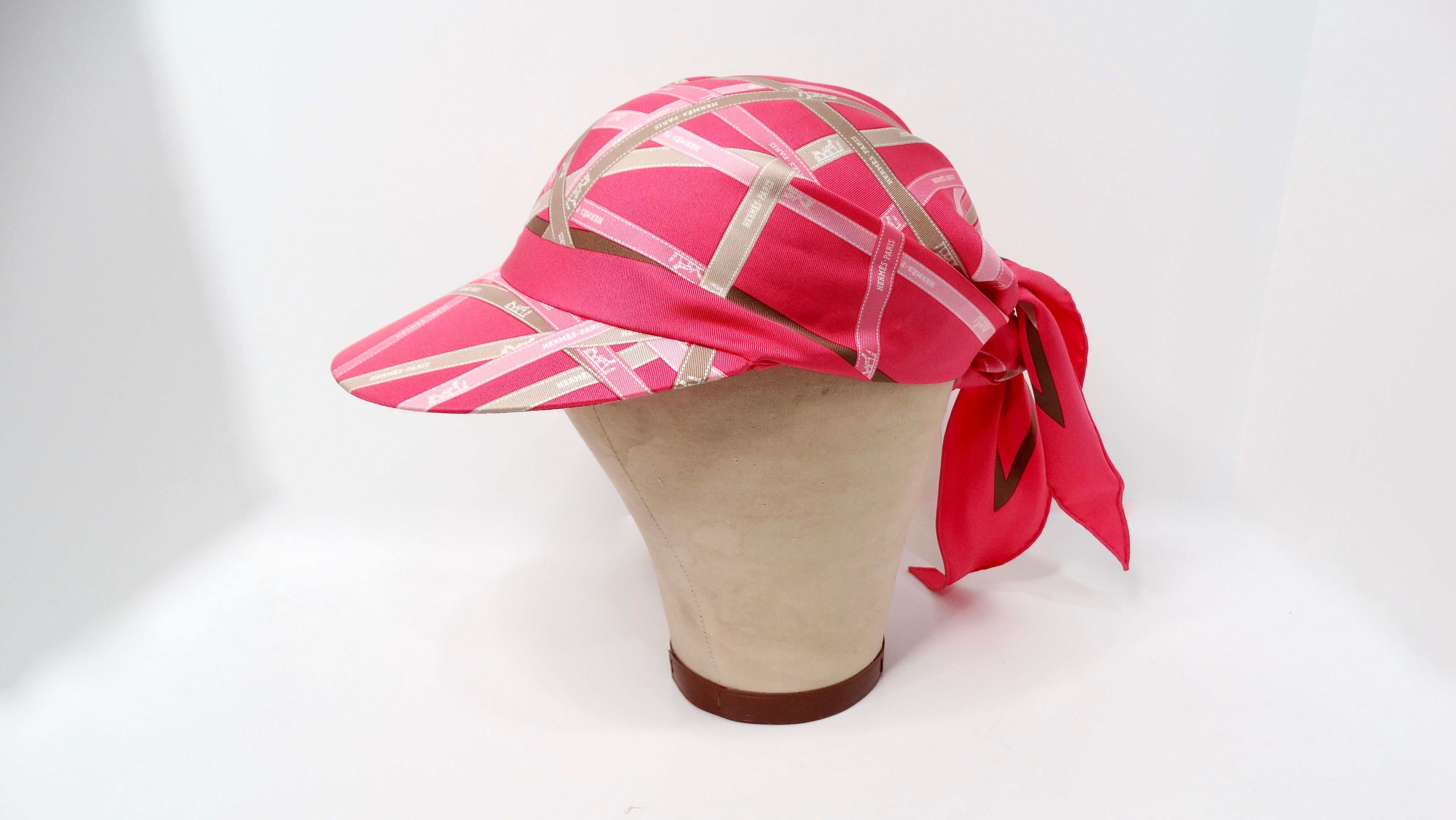 The Hermes Pink Stripe Ribbon Motif Silk Scarf Hat is a stunning accessory that embodies the luxurious elegance associated with the Hermes brand. Crafted from the finest silk, this hat features a chic pink ribbon motif, making it a standout piece