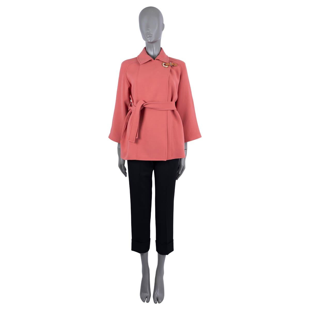 100% authentic Hermès peacoat in pink wool twill (with 1% polyamide). Features a eyelet and belt strap closure at the neck and ties with a belt. Unlined. Has been worn and is in excellent condition.

2022 Spring/Summer

Measurements
Tag