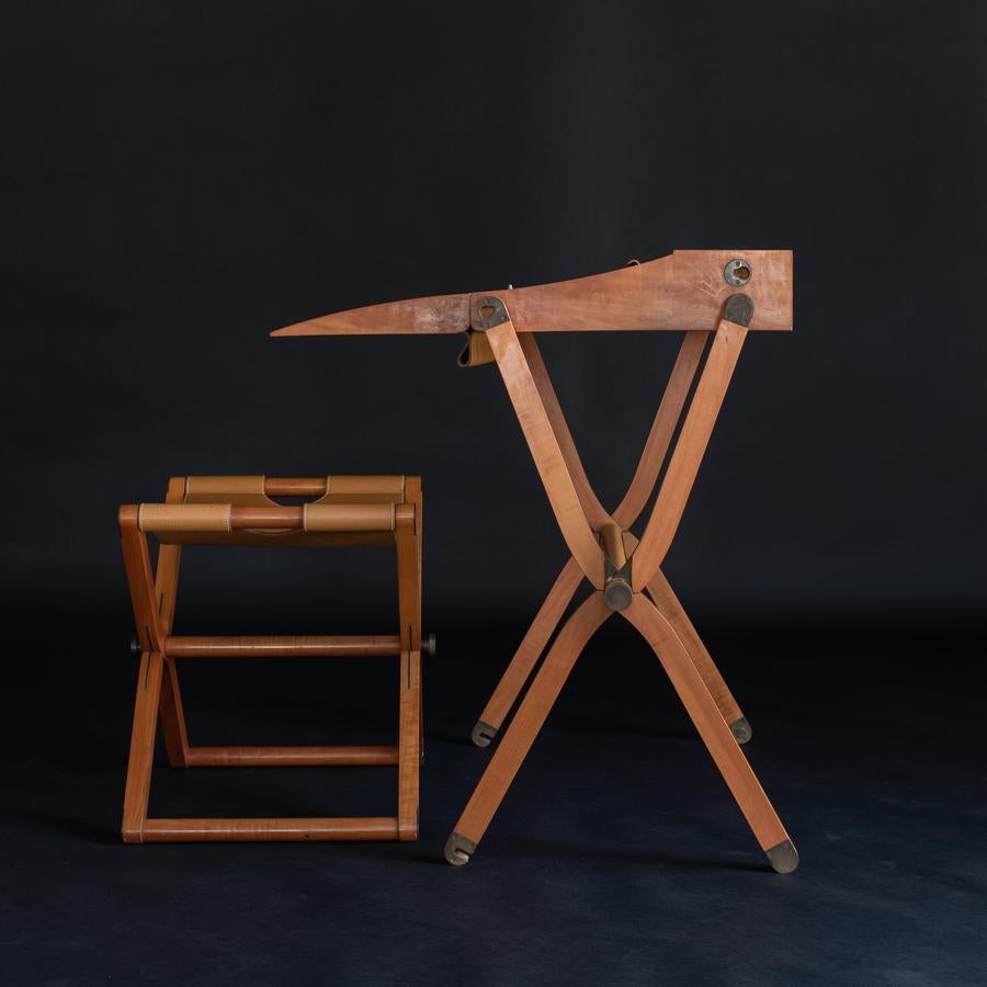 'Pippa' writing desk and matching seat made in pearwood and natural cowhide, in a colour Hermès call 'Naturel Sable'. A Modern interpretation of eighteenth and nineteenth century Campaign style furniture.

Impressed with the manufacturer's mark to