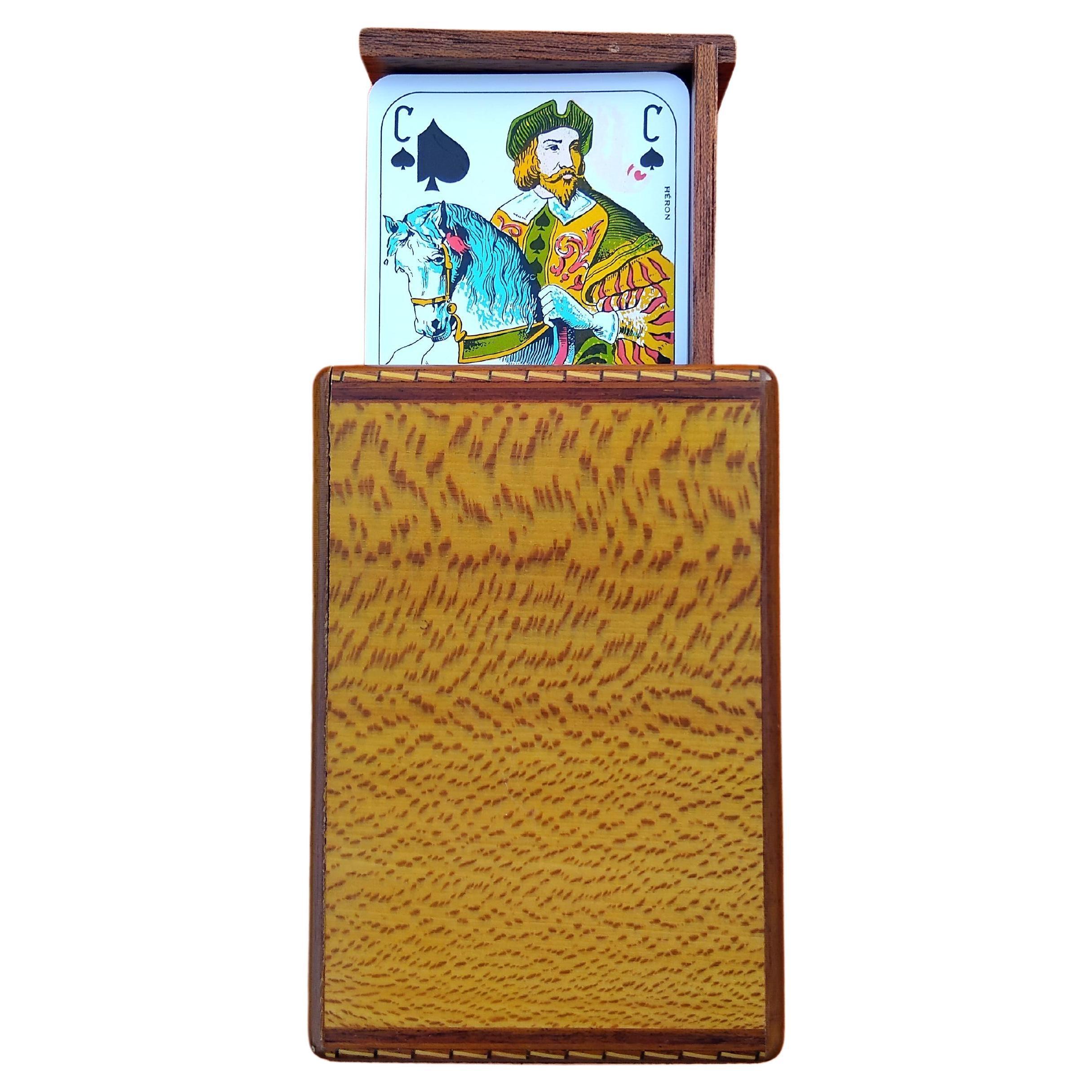 Please note: cards seen on photo are for display purpose only. Not included in the sale

Exceptional Authentic Hermès Playing Cards Case

Rare item, super chic ! 

Can hold a tarot deck of 78 cards measuring 6 cm by 11.2 cm

Made in France

Made of