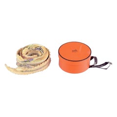 Hermès. Pleated scarf made of 100% silk. 
Au Pays de Cocagne
