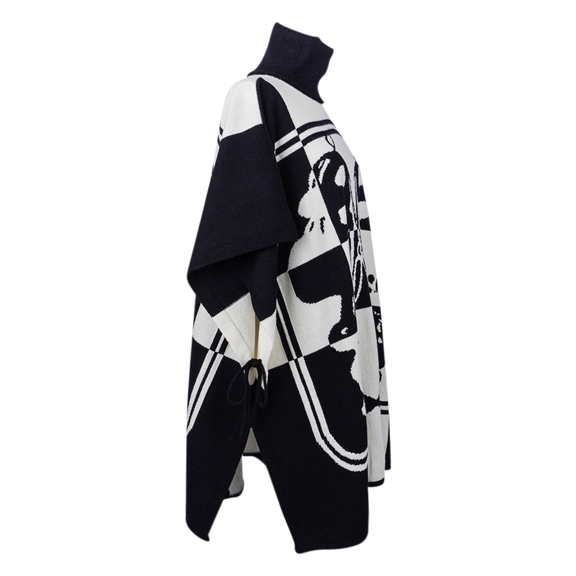 Mightychic offers an Hermes Poncho Brides de Gala Sweater White / Black Cashmere