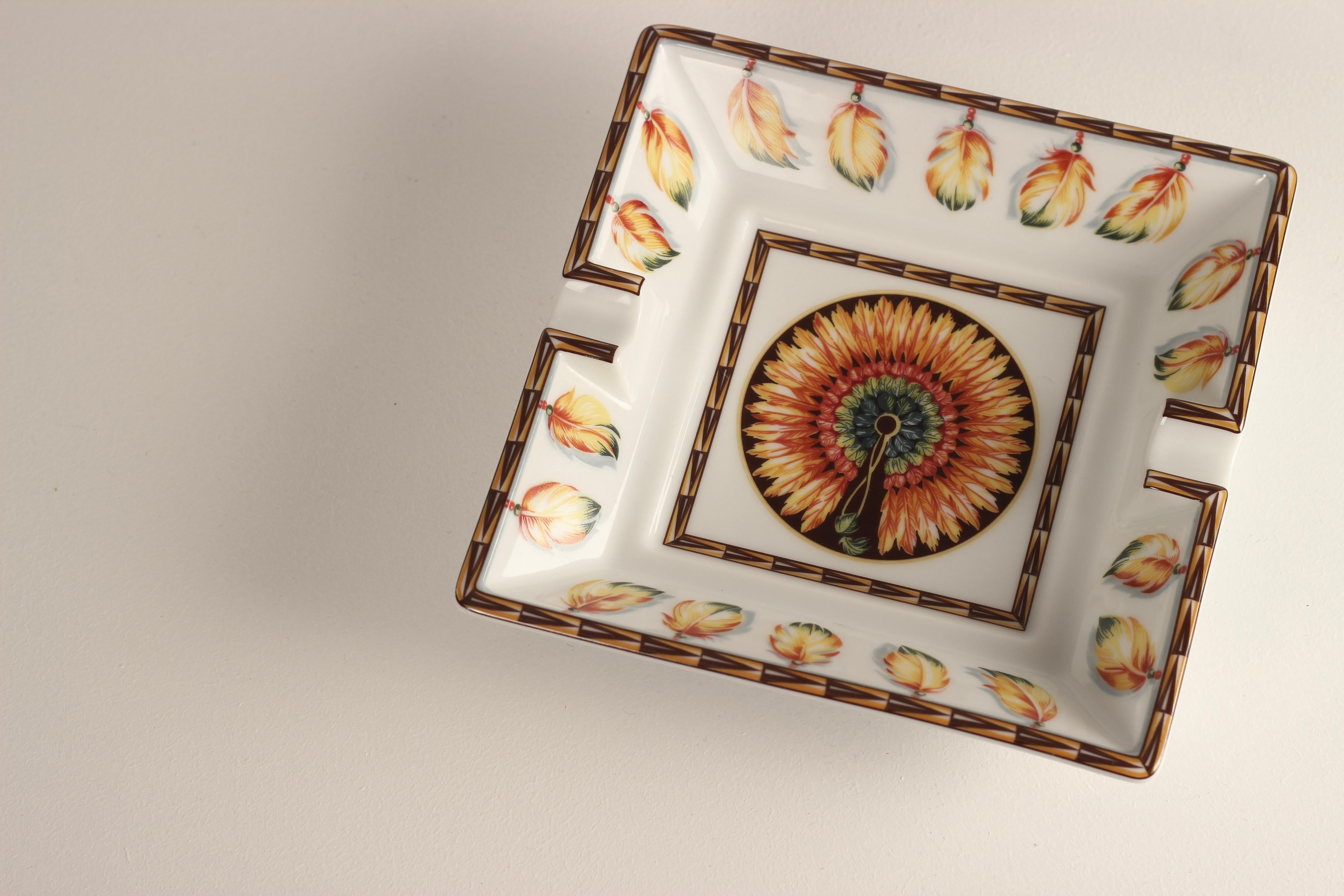 A fine example of Hermès design and its enduring craftsmanship. Produced in the 1990’s, this Square Porcelain Ashtray would also serve well as a key or loose change Tray Vide-Poche Catchall. Exquisitely coloured with a study of a finely detailed