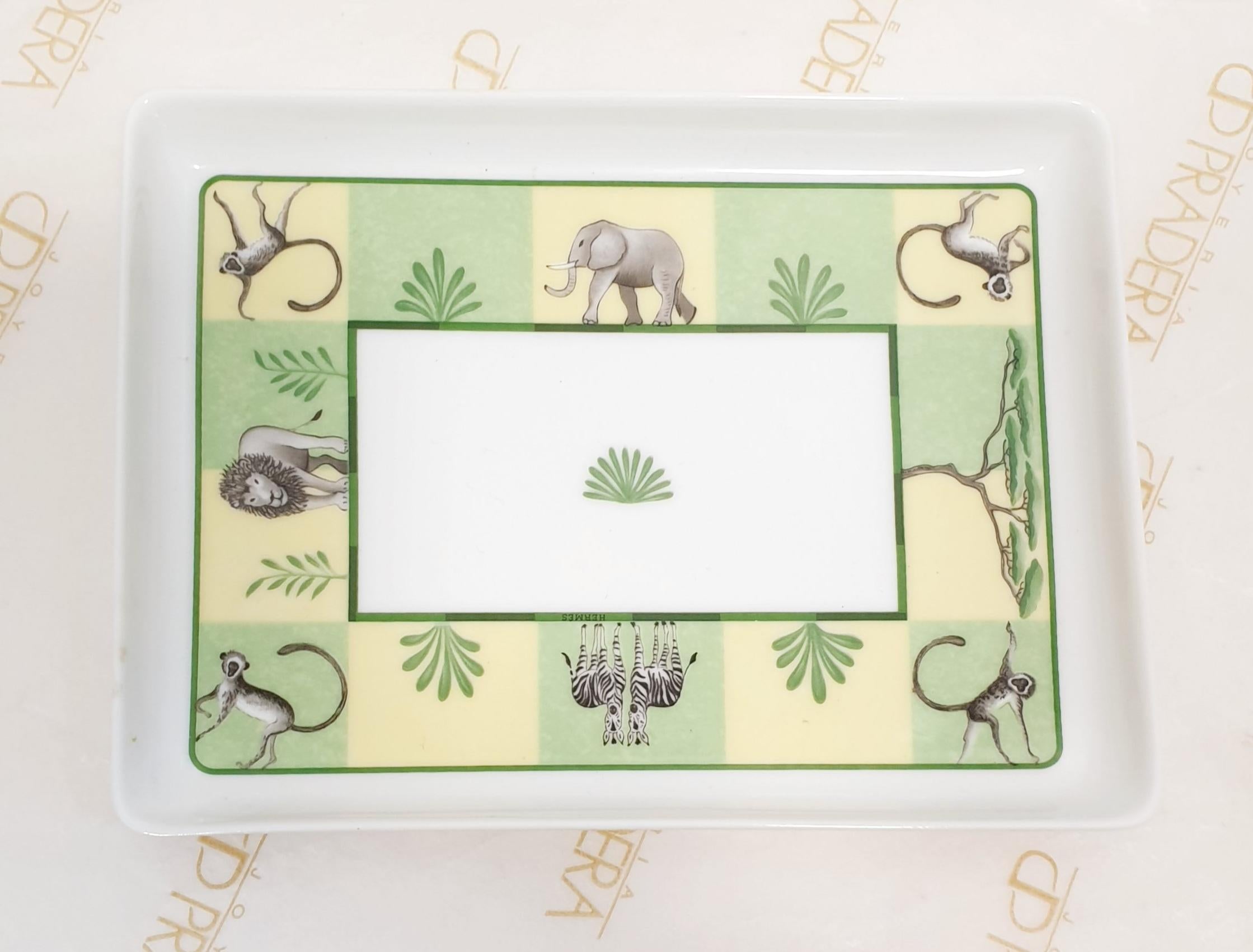 HERMES Porcelain Africa Plate Tableware Green Animal Rare Tracking
Dimensions 16-12 cm
Our Company Fashion Division  is specialized in European Fashion designers, clothing, handbags, accessories and as such we sell original authentic  designer