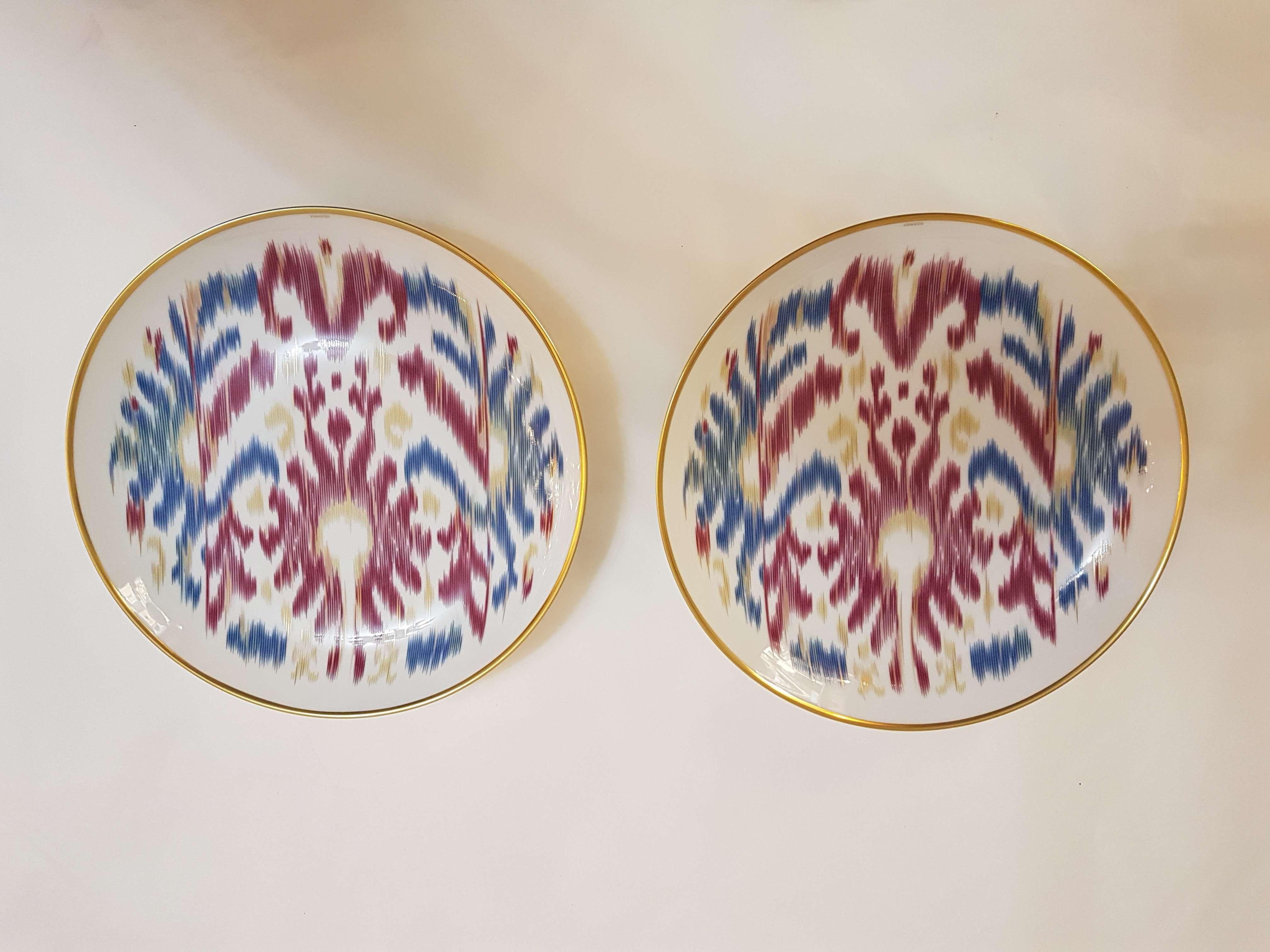 An Hermès porcelain set of two dessert plate, 