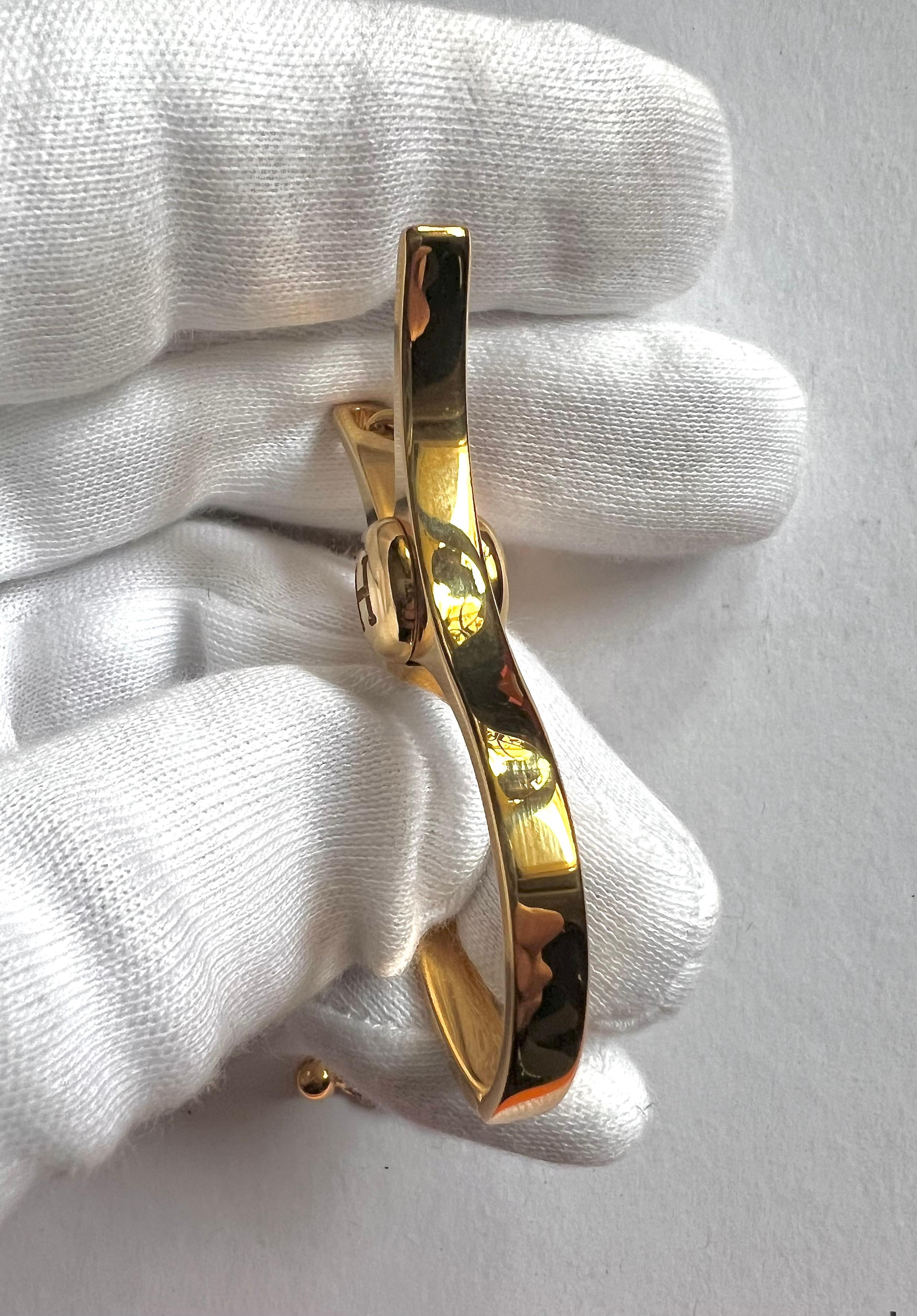 HERMÈS - Handschuhetui aus goldfarbenem Metall im Angebot 1