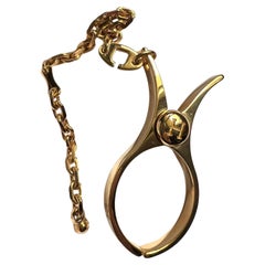 HERMÈS - Porta guanti vintage in metallo gold