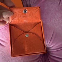 Hermès Faltmünzenetui 8×8 aus gehämmertem Leder Orange - mit Box