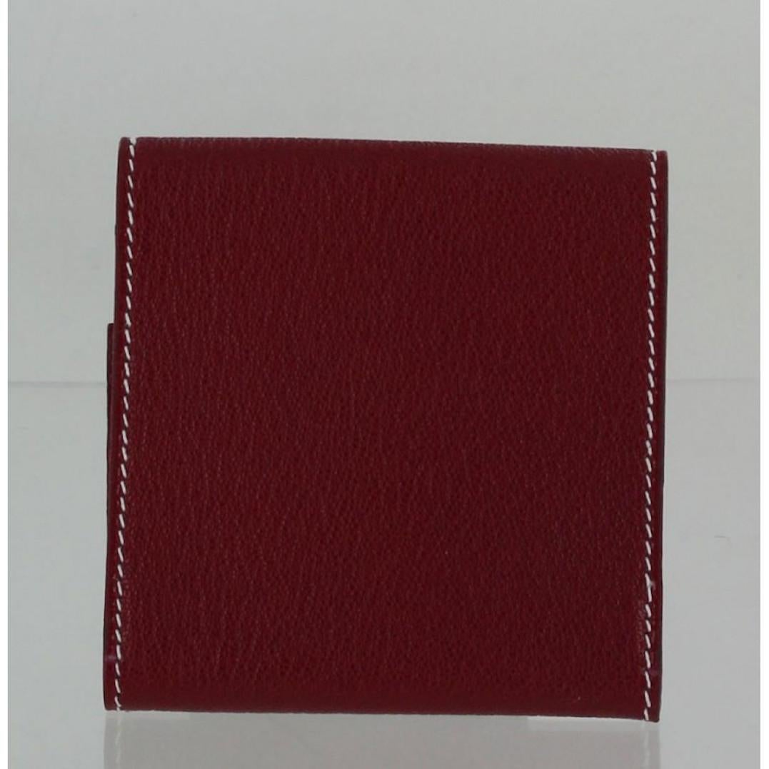 HERMES post it case in red grained leather, buttons HERMES palladium and saddle stitching white. 
Never worn.
Dimensions: Length 21 cm, width: 8 cm
Will be delivered in a non original pouch.