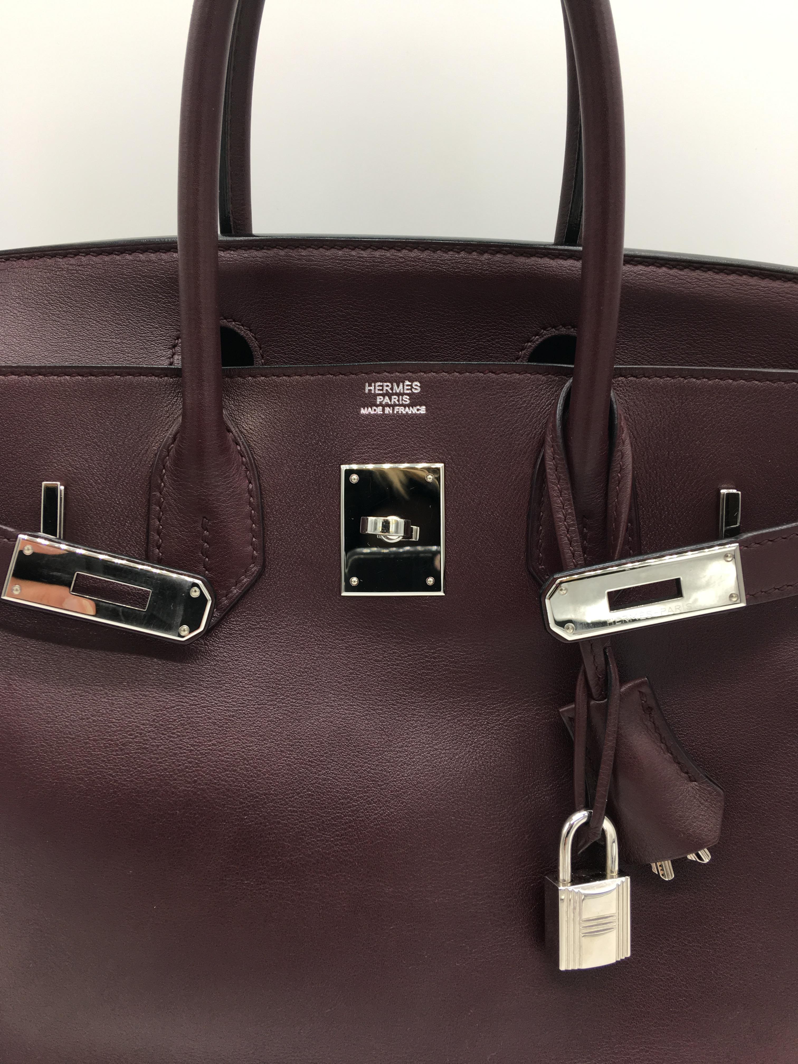 A beautiful Preloved Birkin 30 in Prune which is a great dark colour, more brown than purple but with a hints of red as well.  It’s a lovely alternative to black and equally versatile.  In Swift Leather with Palladium Hardware.
It is L stamp but in