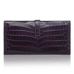 Hermès Prune Niloticus Crocodile Jige PM Clutch Bag
