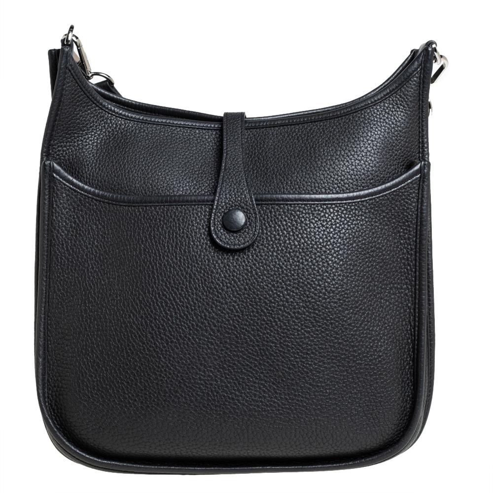 Hermes is a brand that delivers designs with art and creativity and this Evelyne is just another proof. Finely crafted from leather in a black shade, and featuring an adjustable shoulder strap, this piece is a classic. The bag is spacious enough to
