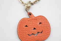 Hermès pumpkin charm in leather