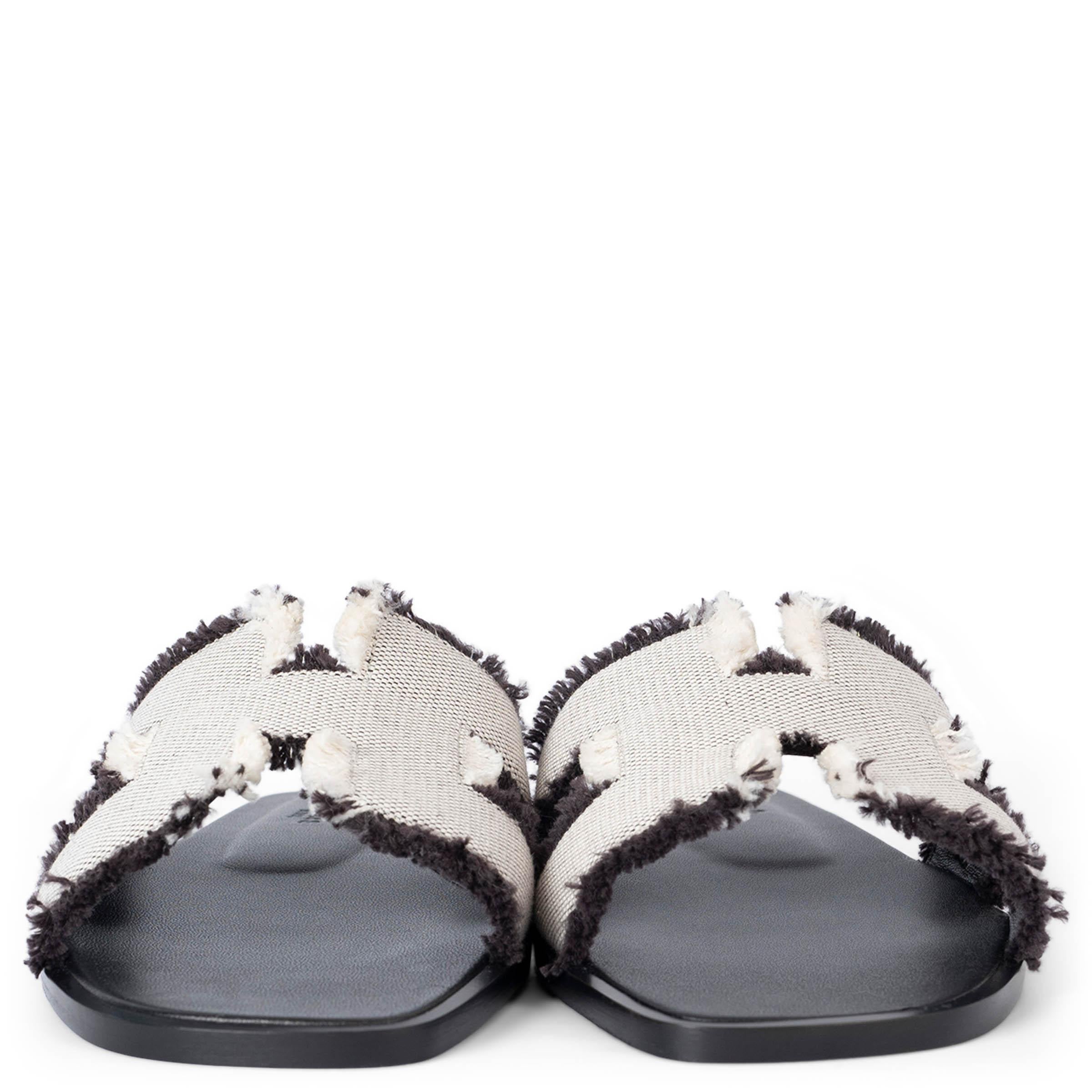 100% authentic Hermès Oran sandal in Prunoir fringed Toile H with iconic 