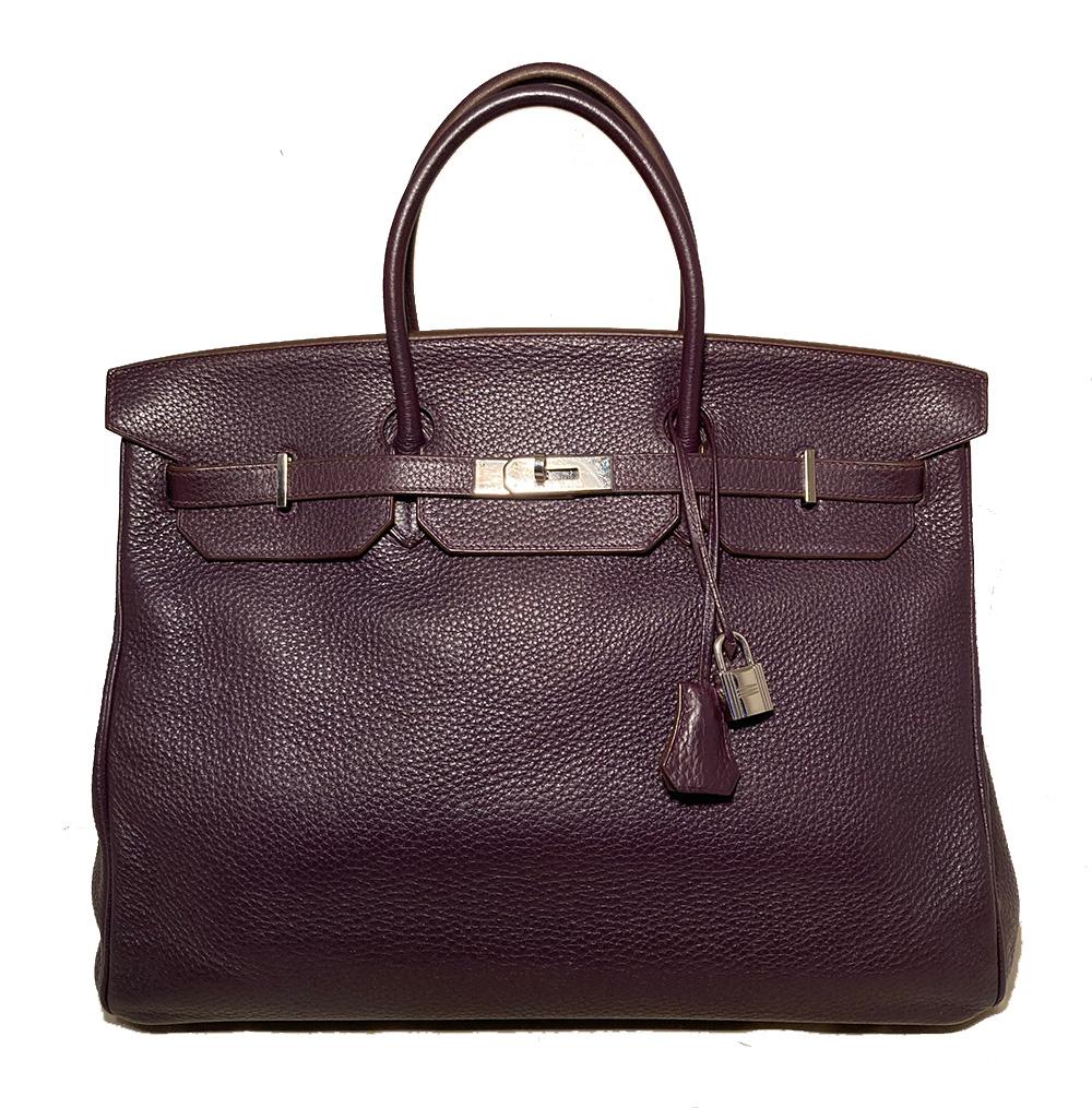 Hermes Purple Clemence Birkin 40 in excellent condition. Deep purple clemence leather exterior trimmed with silver palladium hardware. Front twist lock double strap triple notch top flap closure opens to a matching purple kidskin leather lined