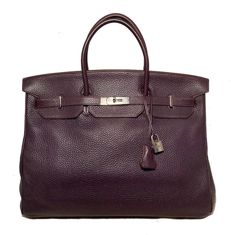 Hermes Purple Clemence Birkin 40 in excellent condition. Deep purple clemence leather exterior trimmed with silver palladium hardware. Front twist lock double strap triple notch top flap closure opens to a matching purple kidskin leather lined