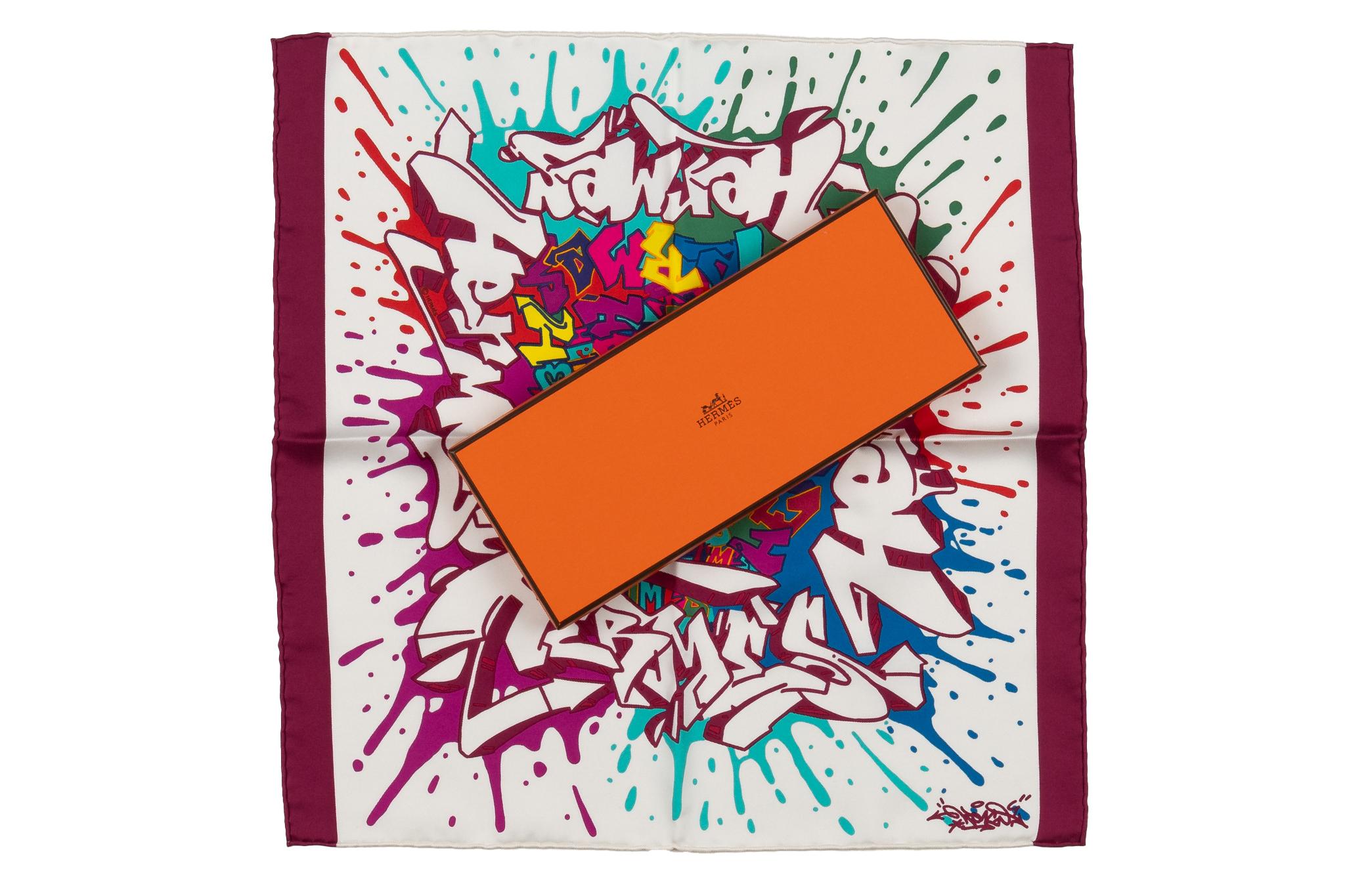 This multi-pink silk scarf was created by graffiti artist and Co-founder of the International Graffiti Festival Kongo. Brand new in box.