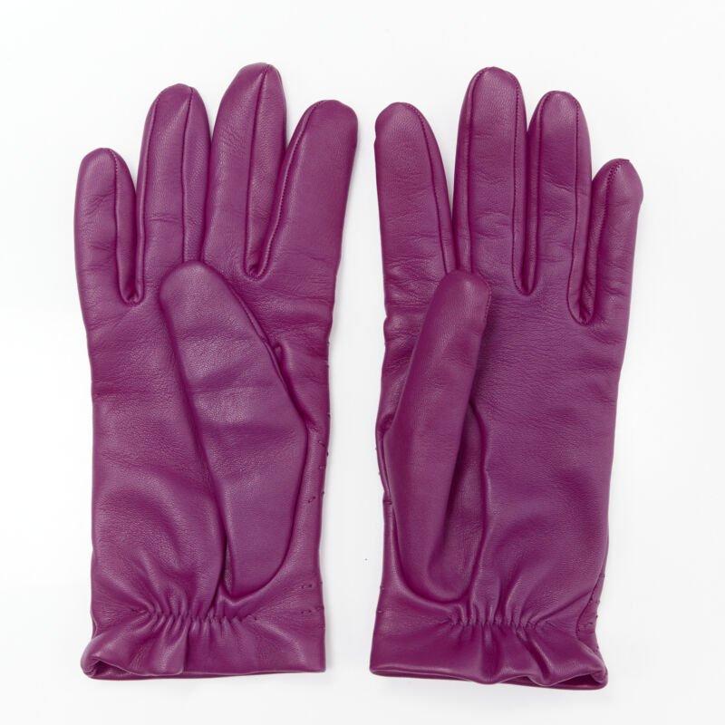 HERMES purple lamb leather overstitching 100% cashmere lined glove 7.5
Reference: MELK/A00164
Brand: Hermes
Material: Leather
Color: Purple
Pattern: Solid
Lining:  Cashmere
Extra Details: Elasticated stretch cuff
Made in: