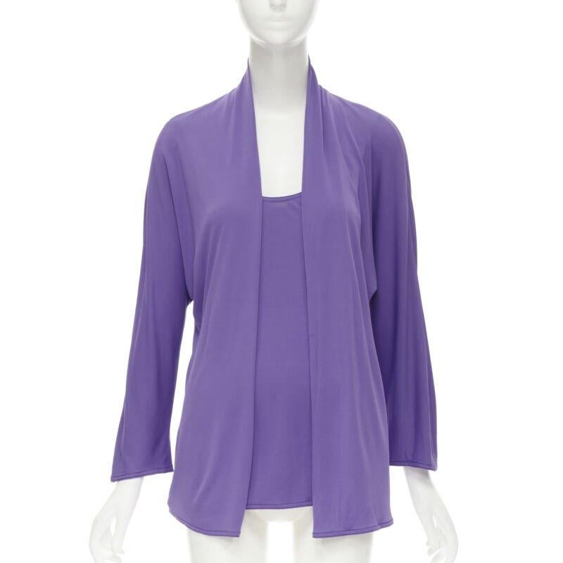 HERMES purple viscose scoop neck double layered belted cardigan top FR38 S
Reference: JYLM/A00015
Brand: Hermes
Material: Viscose
Color: Purple
Pattern: Solid
Closure: Belt
Extra Details: Faux layered front. Belt loop slit at side seams.
Made in: