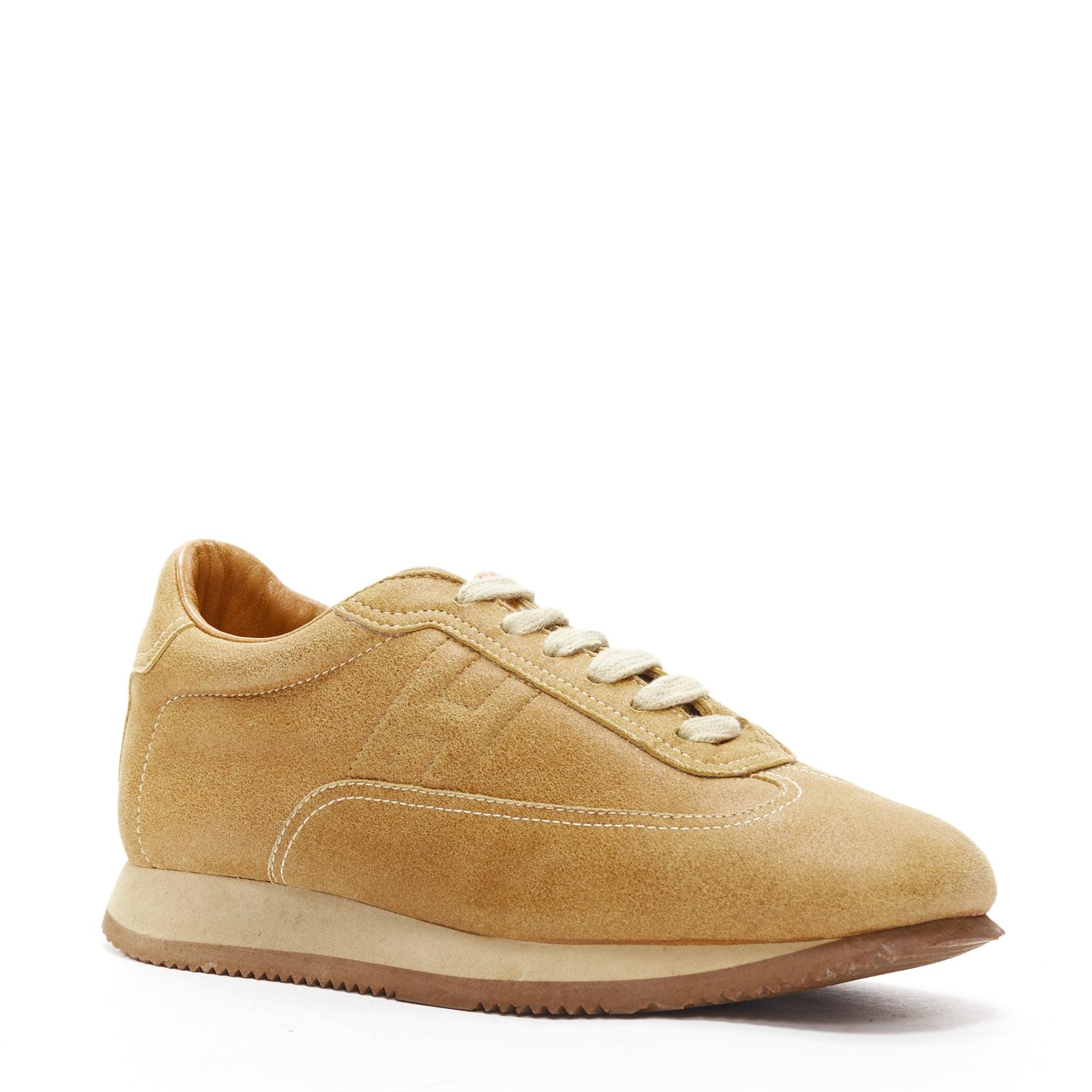 HERMES Quick tan suede H logo low top sneakers EU37.5
Reference: GIYG/A00362
Brand: Hermes
Model: Quick H
Material: Leather
Color: Brown
Pattern: Solid
Closure: Lace Up
Lining: Brown Leather
Extra Details: The sides of each shoe feature an