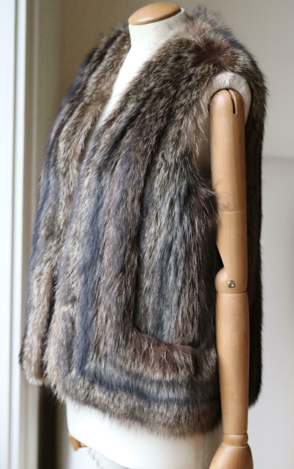 Hermès' vest will elevate any outfit to something truly special, made in France, it's covered with striped soft raccoon-fur and lined in printed silk to layer smoothly over dresses and knitwear alike.
Tonal-brown raccoon-fur.
Slips on. 
100%