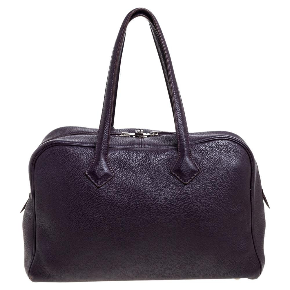 Bags as well-crafted as this one from Hermes don't cross our paths often because they are exclusive. The Victoria II comes wonderfully crafted from Clemence leather and designed with double zippers that can be secured by a flip-lock. It carries an