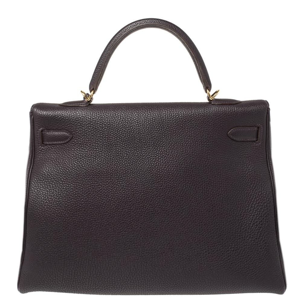 Inspired by none other than Grace Kelly of Monaco, Hermes Kelly is carefully hand-stitched to perfection. This Kelly Retourne is crafted from leather and has gold-tone hardware. Retourne has a more casual look and is stitched on the inside thus