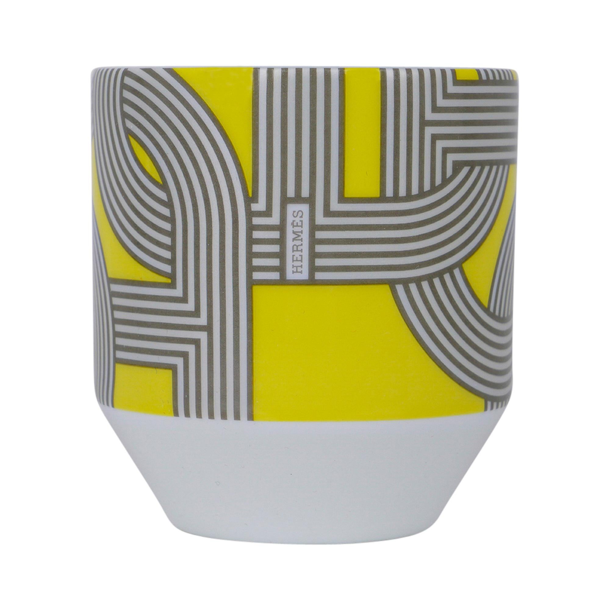 Guaranteed authentic Hermes Rallye 24 Tumblers Limoge Porcelain set of 6.
This beautiful and colorful porcelain Hermes tea set creates a perfect setting for any table.
Design inspired by the Chaine d'ancre here it changes into a racetrack with