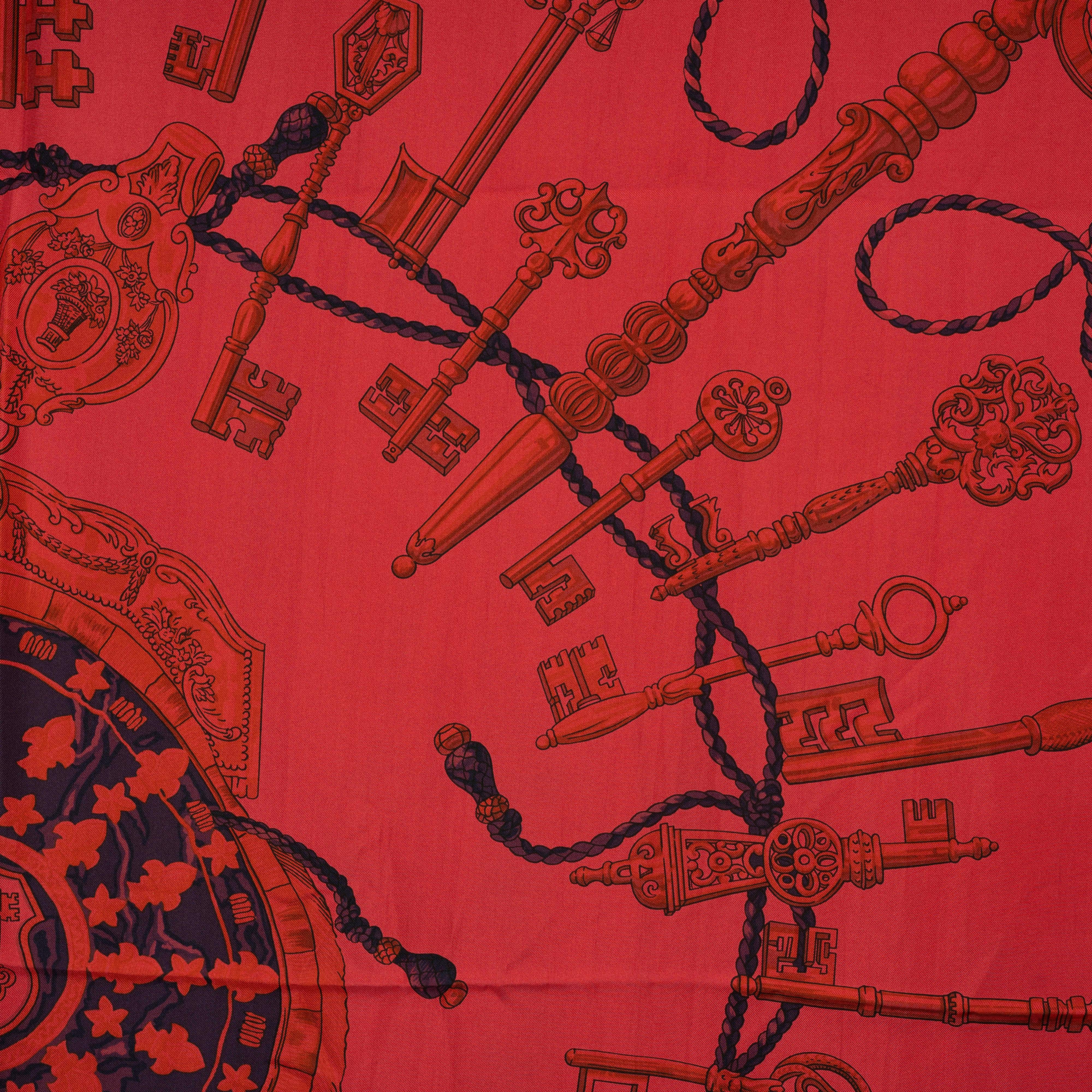 This 100% authentic Hermès Les Cles 140 Surteint scarf, designed by Cathy Latham, is crafted from raspberry silk (100%) and features an eggplant border. The scarf showcases the iconic Les Cles print and has been washed using a dip-dye technique,