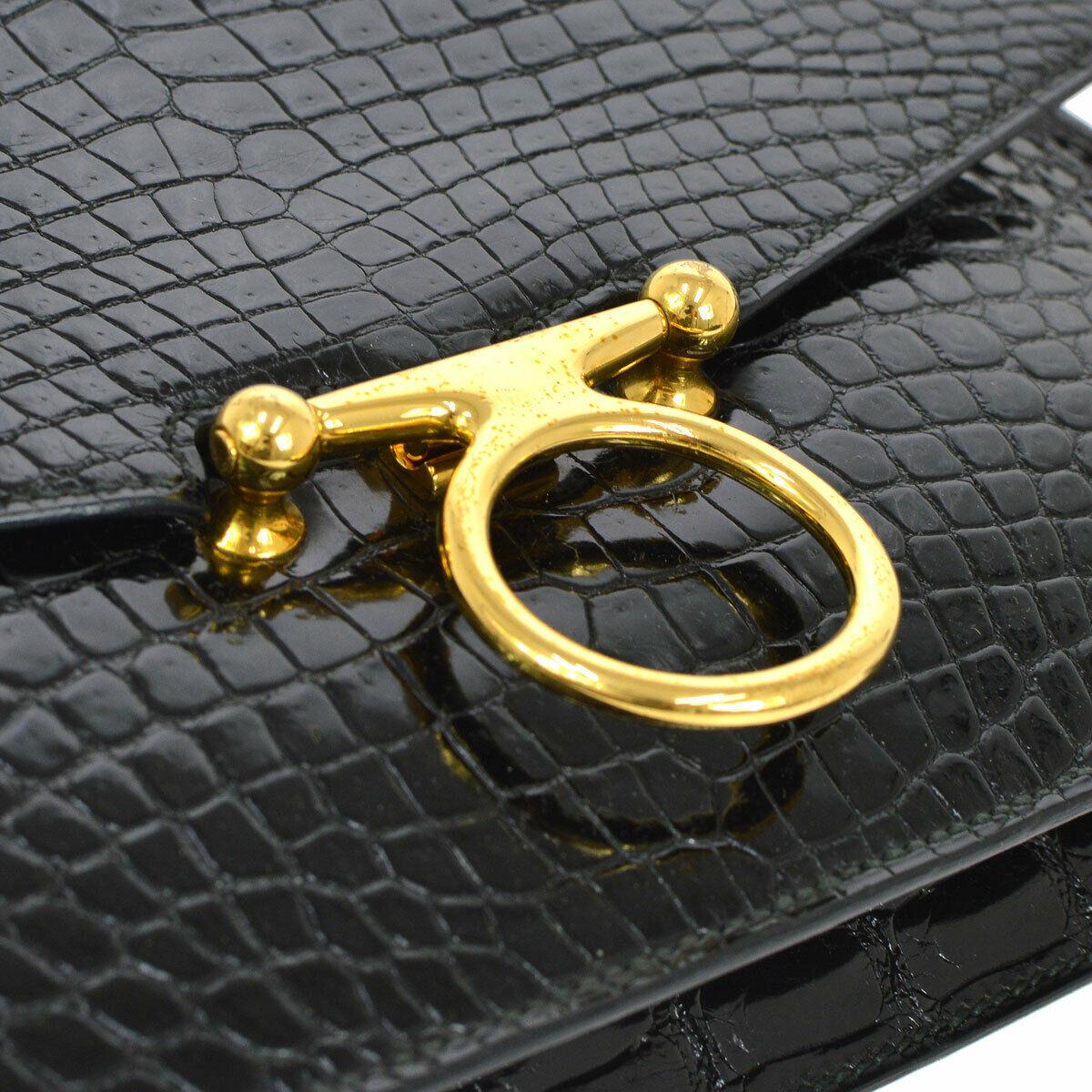 Hermes Rare Black Crocodile Exotic Leather Gold Evening Shoulder Flap Bag in Box

Crocodile
Gold hardware
Leather lining 
Made in France
Shoulder strap drop 18.5