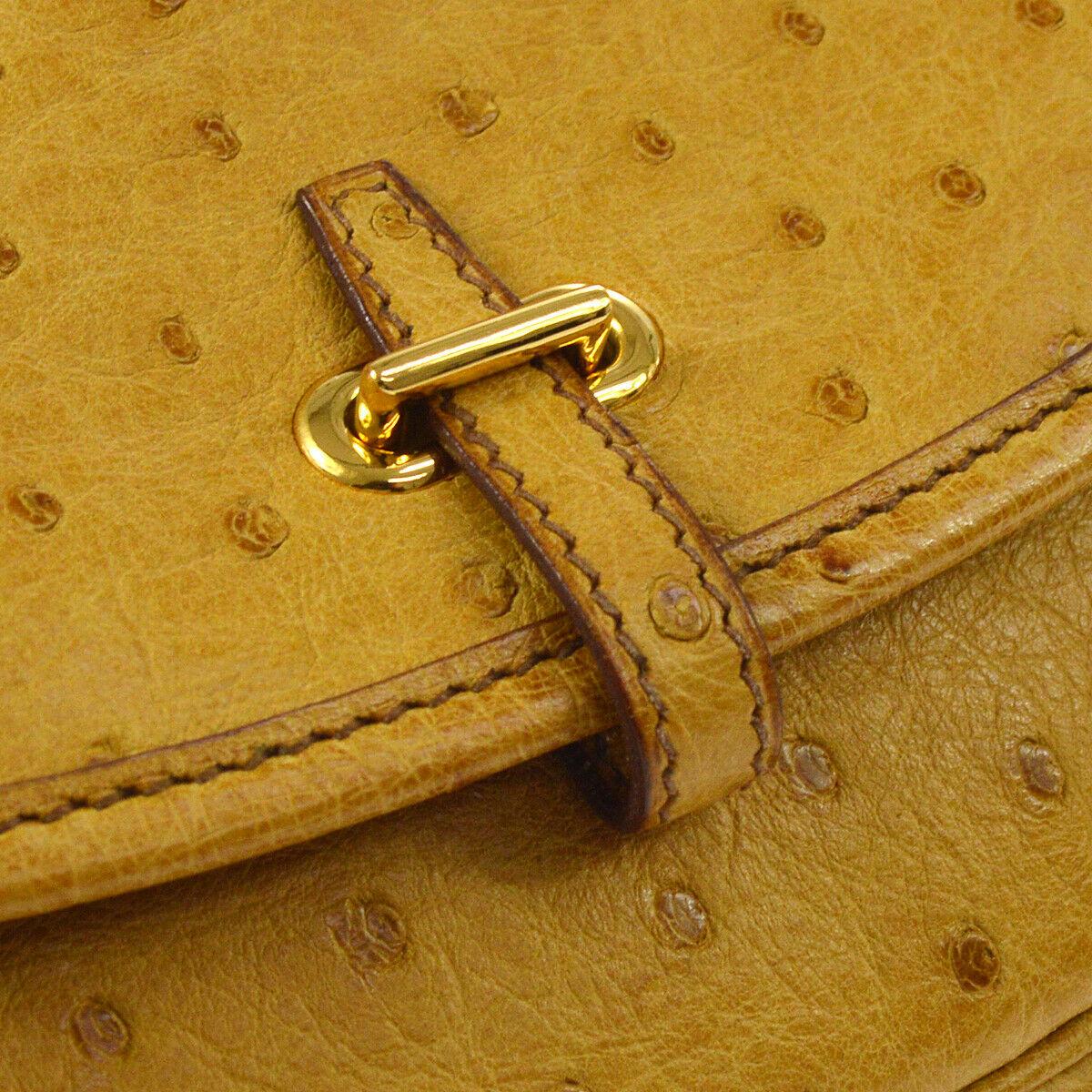 Hermes Rare Mustard Ostrich Leather Gold Small Mini Shoulder Flap Bag

Ostrich
Gold tone hardware 
Leather lining
Fold in buckle closure
Date code present
Made in France
Adjustable shoulder strap drop 19-20