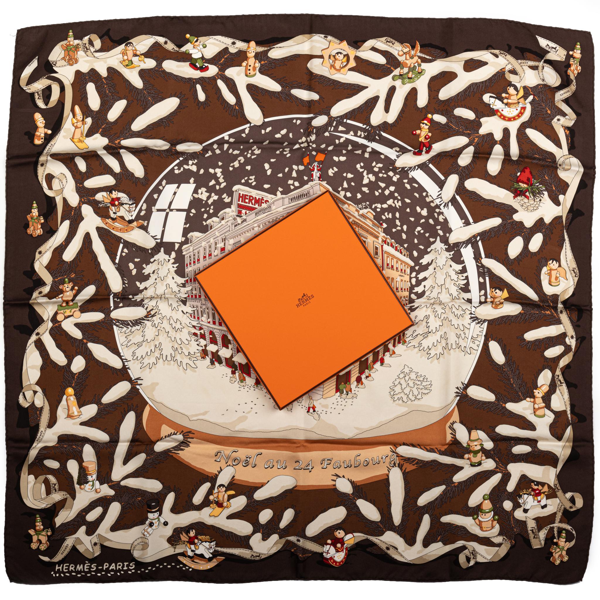 Hermès rare and collectible Noel au Faubourg silk scarf in brown . Hand rolled edges. Composition and care instructions label . Comes with original box.