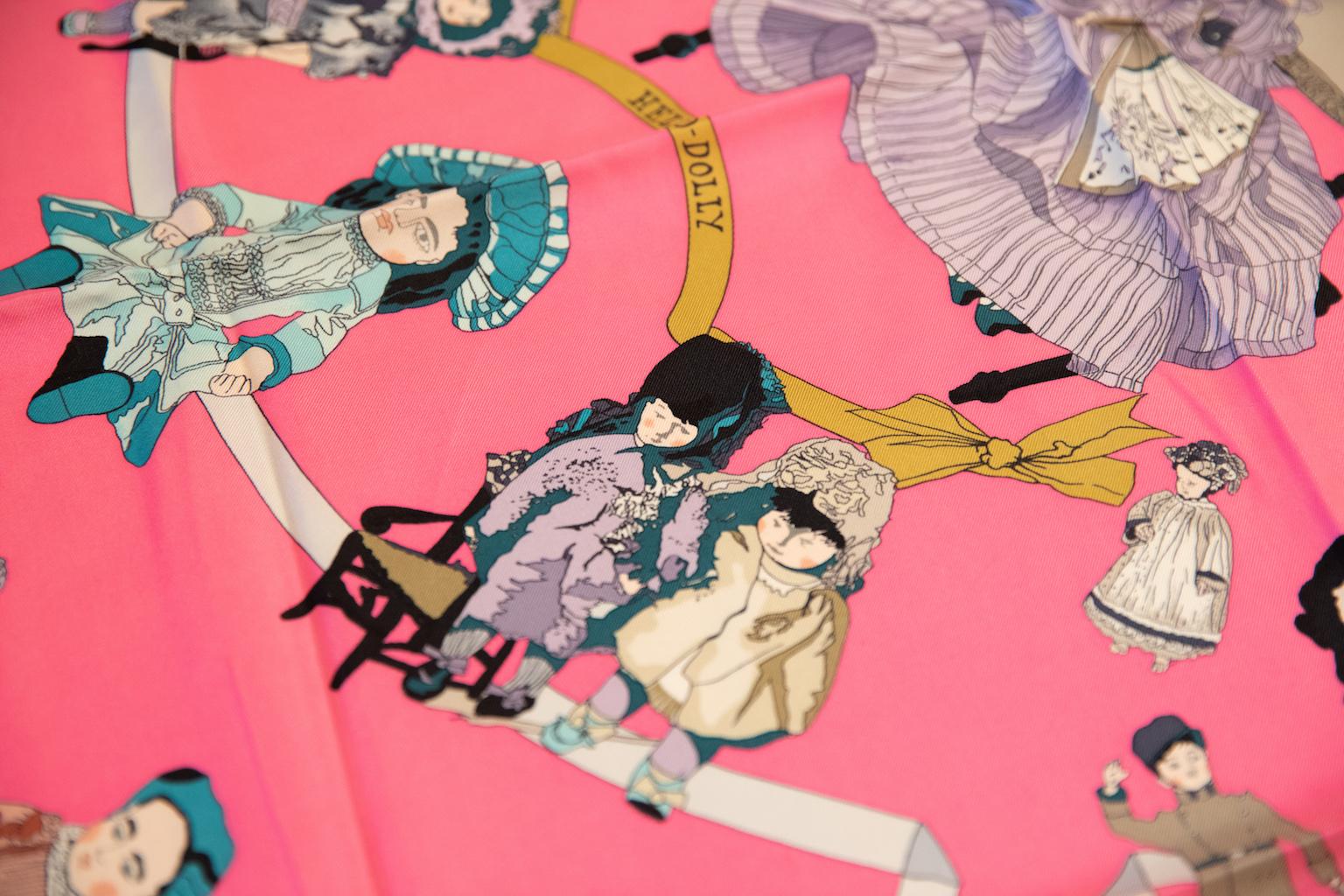Hermès silk twill scarf collectible Hello Dolly in purple pink combination. Hand-rolled edges.
