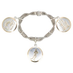 Hermès: Seltenes Vintage-Armband aus geflochtenem Netz und Medaillen aus Silber und Vermeil
