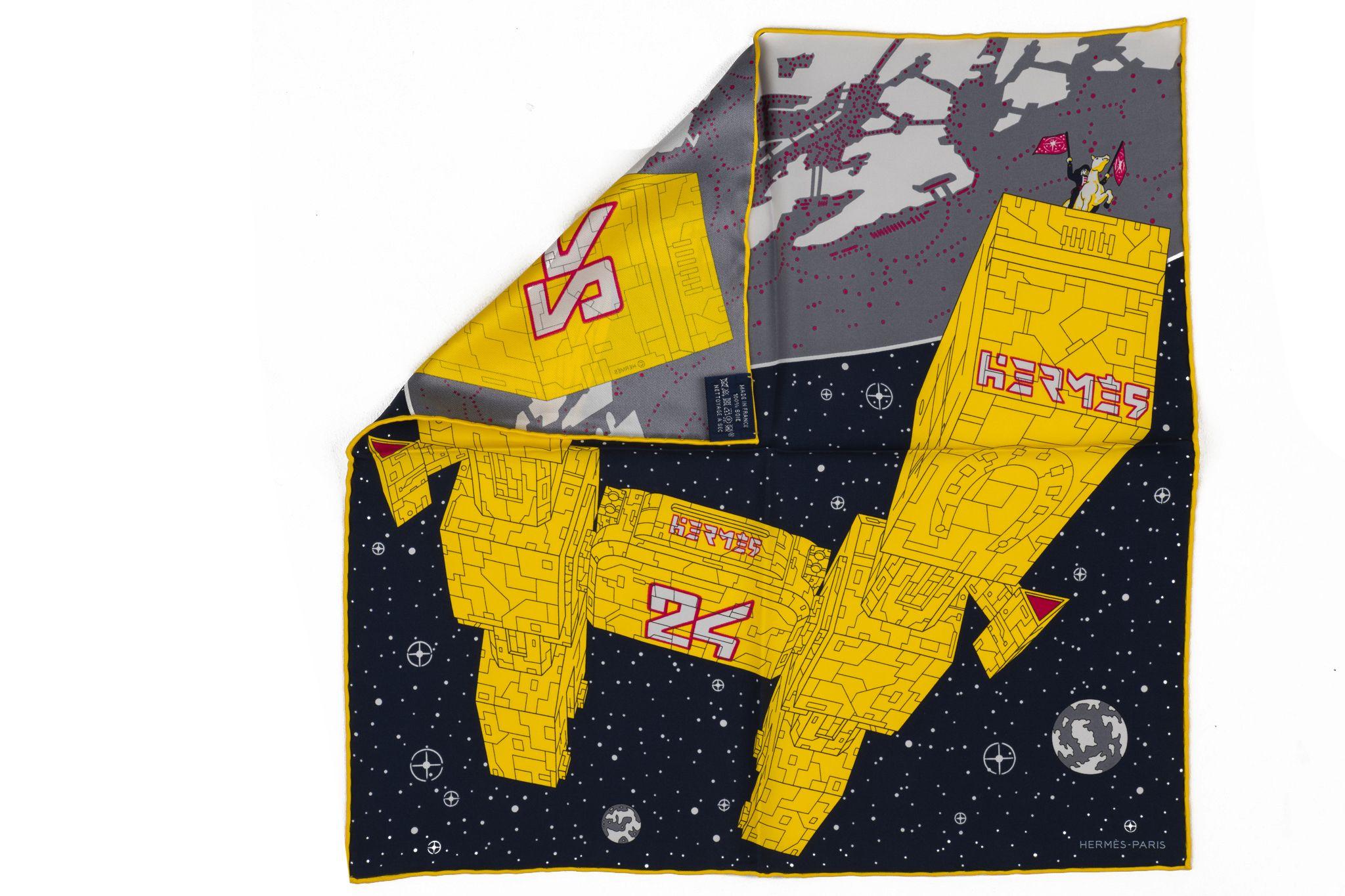 Hermès new collectible silk gavroche, spaceship design in yellow and grey. Hand rolled trim. Comes with original box.