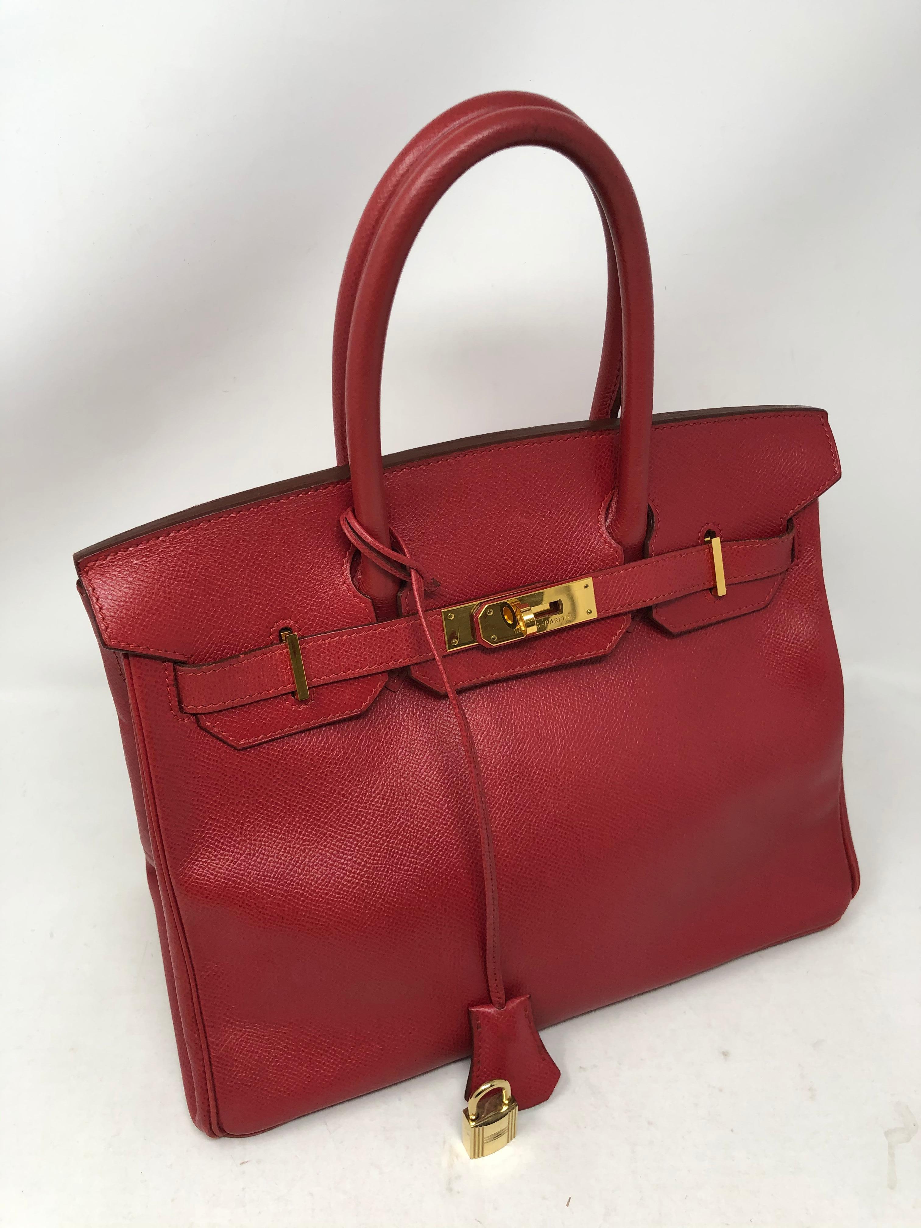 Hermes Red Birkin 30 with Gold Hardware. Vintage Courchevel leather. Vintage Birkin from 1995. Excellent condition. Has light wear on corners. Please see all photos. Most wanted size 30. Very hard to find. Interior is clean. Includes clochette and