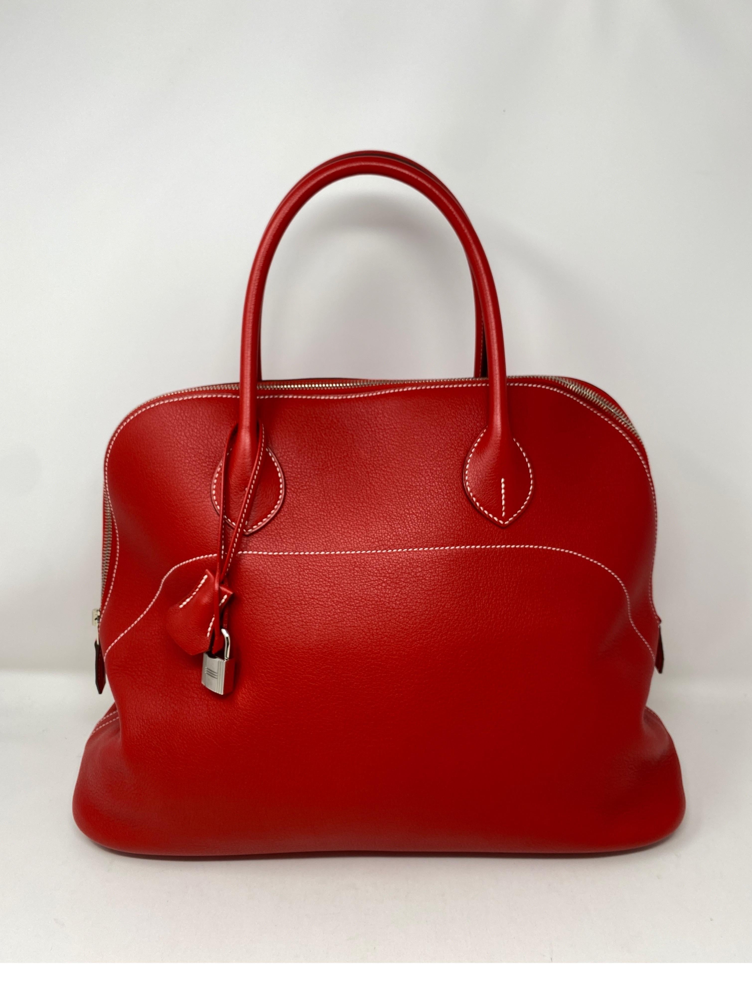 Hermes Red Bolide Bag. Beautiful red leather Hermes bag. Palladium hardware. Large size Bolide. Includes clochette, lock, keys and dust cover. Guaranteed authentic. 