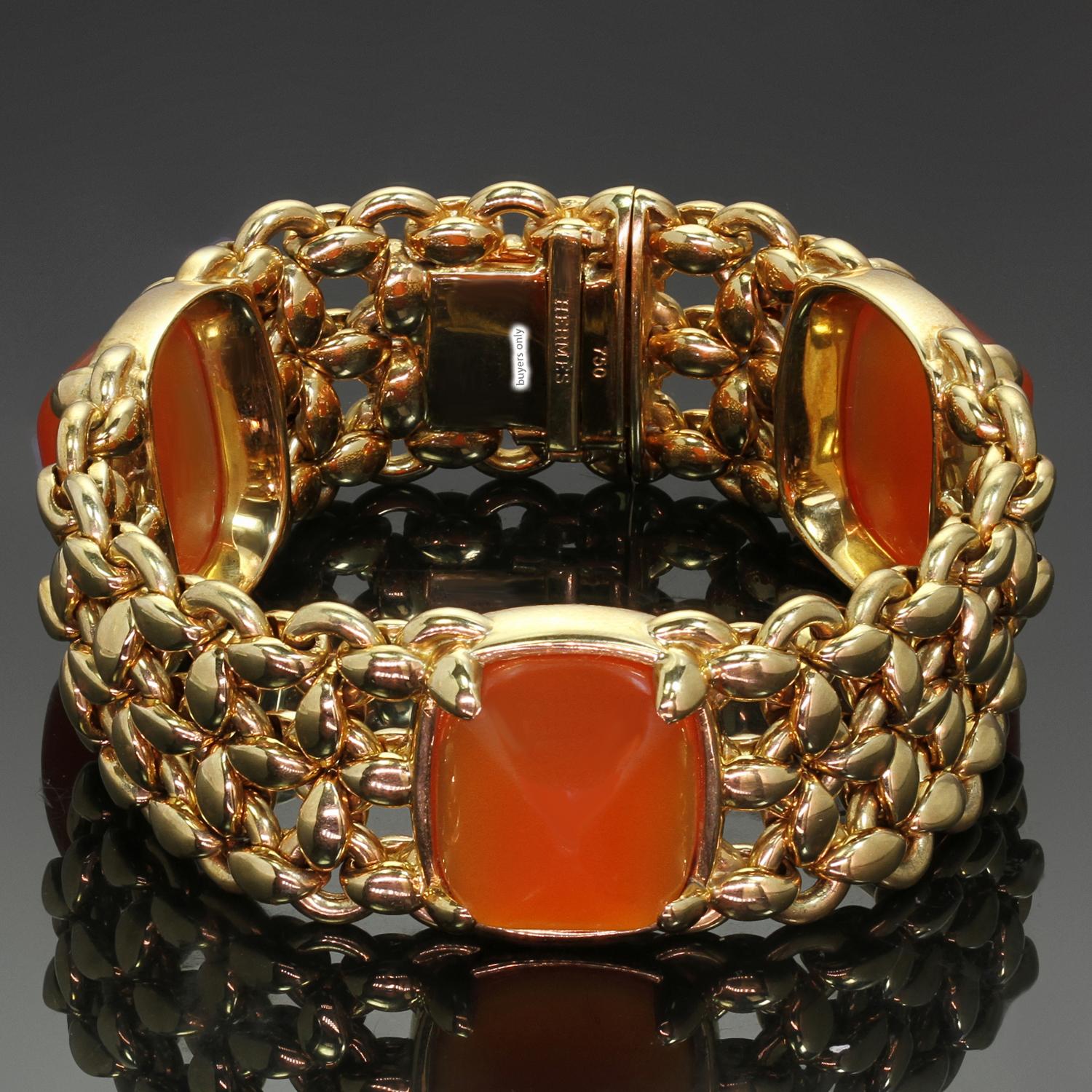 This fabulous Hermes link bracelet is crafted in 18k yellow gold and set with 3 red cornelian gemstones. Made in France circa 1980s. Measurements: 0.86