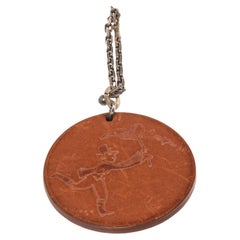 Hermes Red Catch Me Heart Charm with gold-tone hardware. 