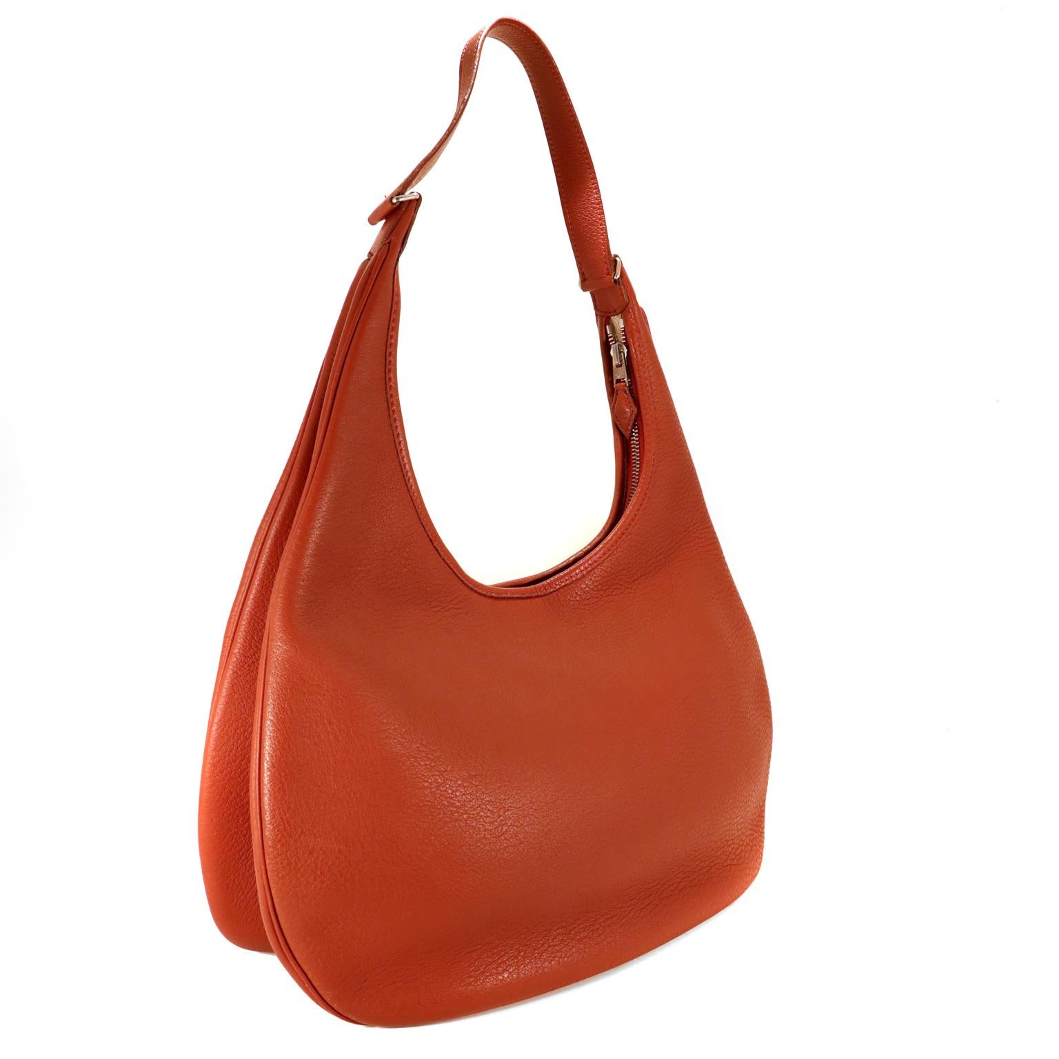 This authentic Hermès Rust Clemence Gao Hobo is in very good condition.  It has enjoyed a previous life and has minor imperfections.  The Gao is no longer in production but remains an understated classic style for everyday enjoyment.  
Rich rust