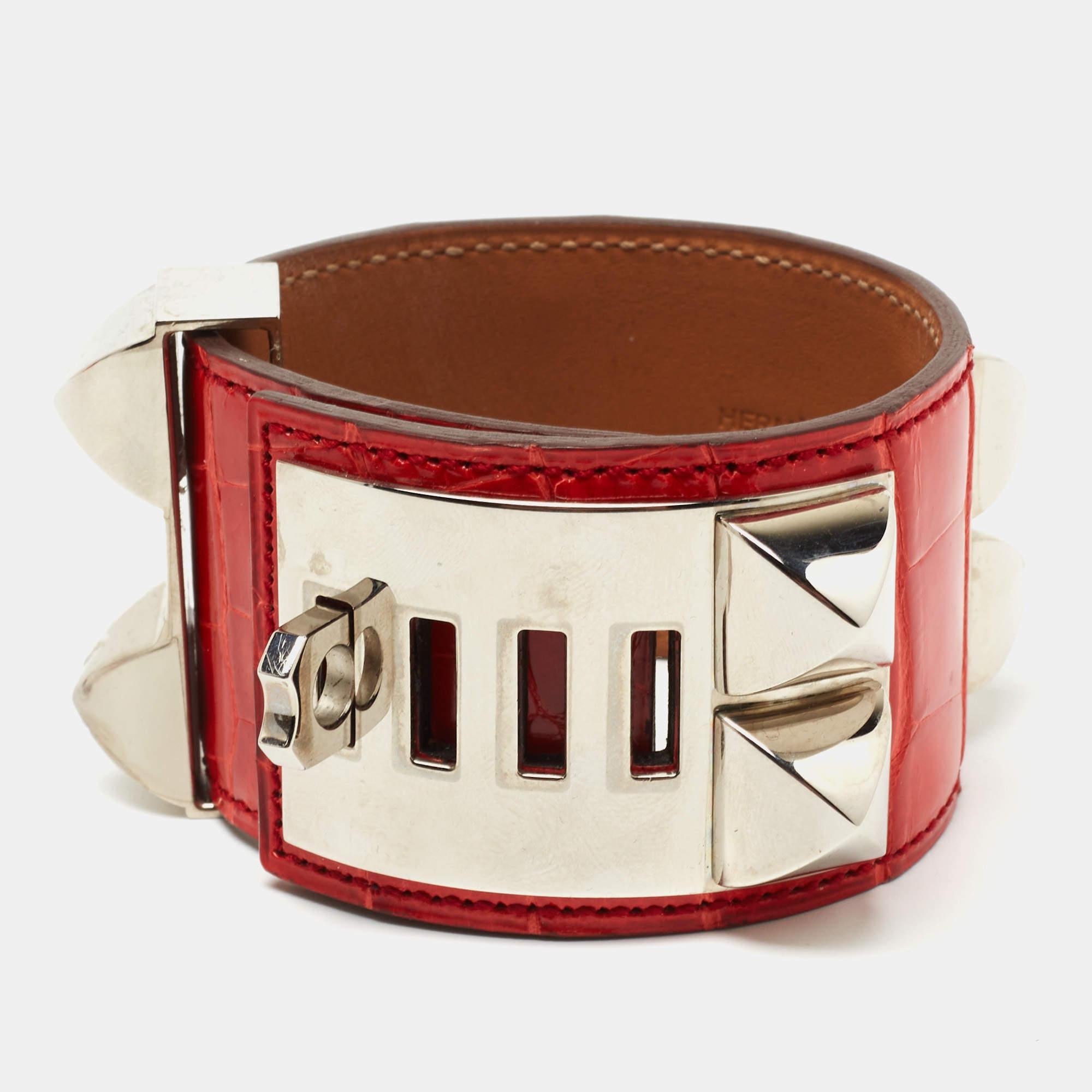 Accessorize classily and stylishly by wearing this bracelet from Hermès. Crafted using red Crocodile leather, this Collier De Chien bracelet is highlighted with Palladium Plated metal. The perfect accessory to amp up your attire.

Includes: Original